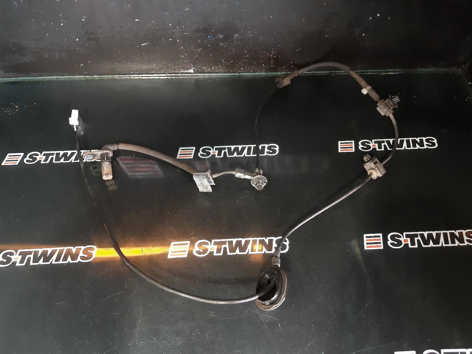 Used auto part listing image: 2016 MAZDA CX3 ABS SENSOR LH REAR, 4WD, MANUAL HANDBRAKE, DK, 03/15- 0000284054