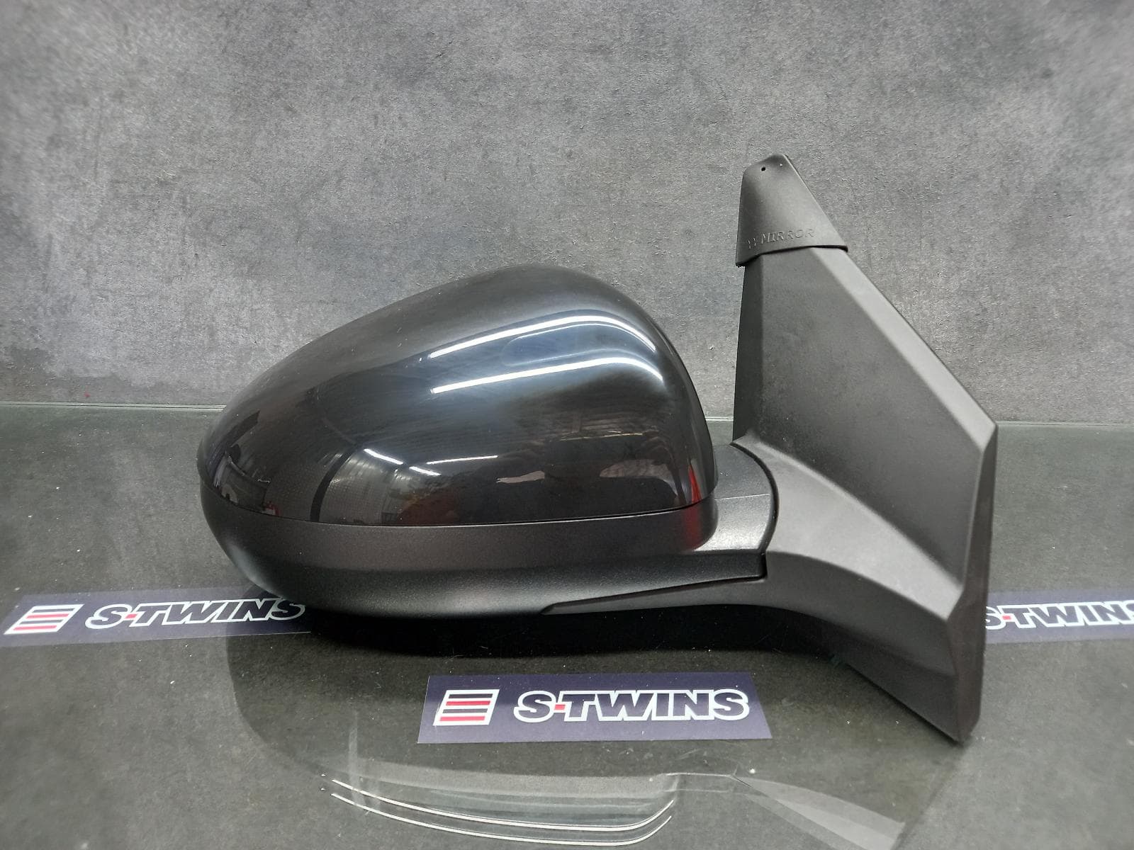 Used auto part listing image: NEW 2014 HOLDEN BARINA RIGHT DOOR MIRROR TM, BLACK, 07/13-08/16 0000148246