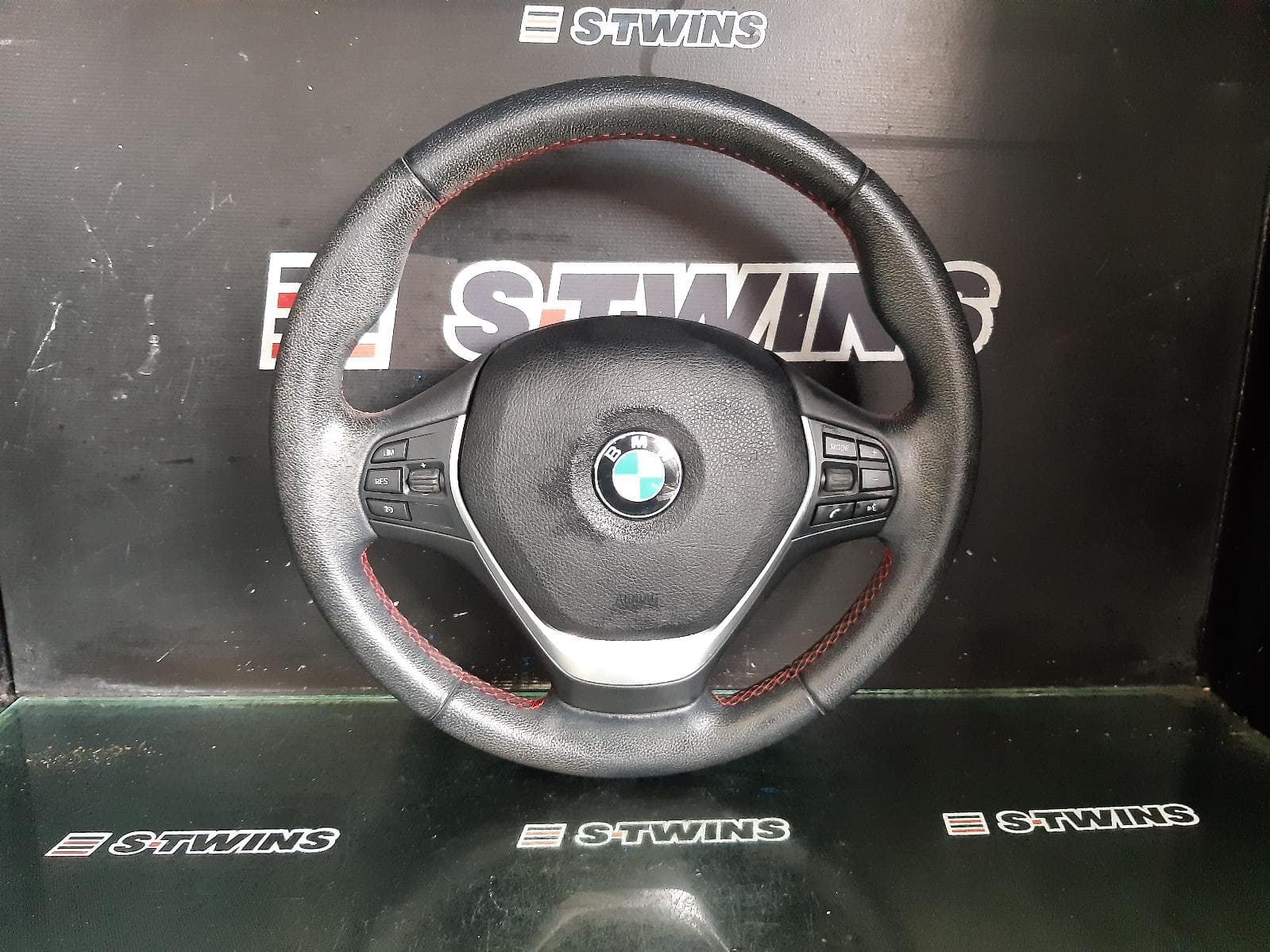 Used auto part listing image: 2016 BMW 1 SERIES STEERING WHEEL F20, HATCH, SPORTLINE, W/ RED STITCHING TYPE, 06/11-04/19 0000315095