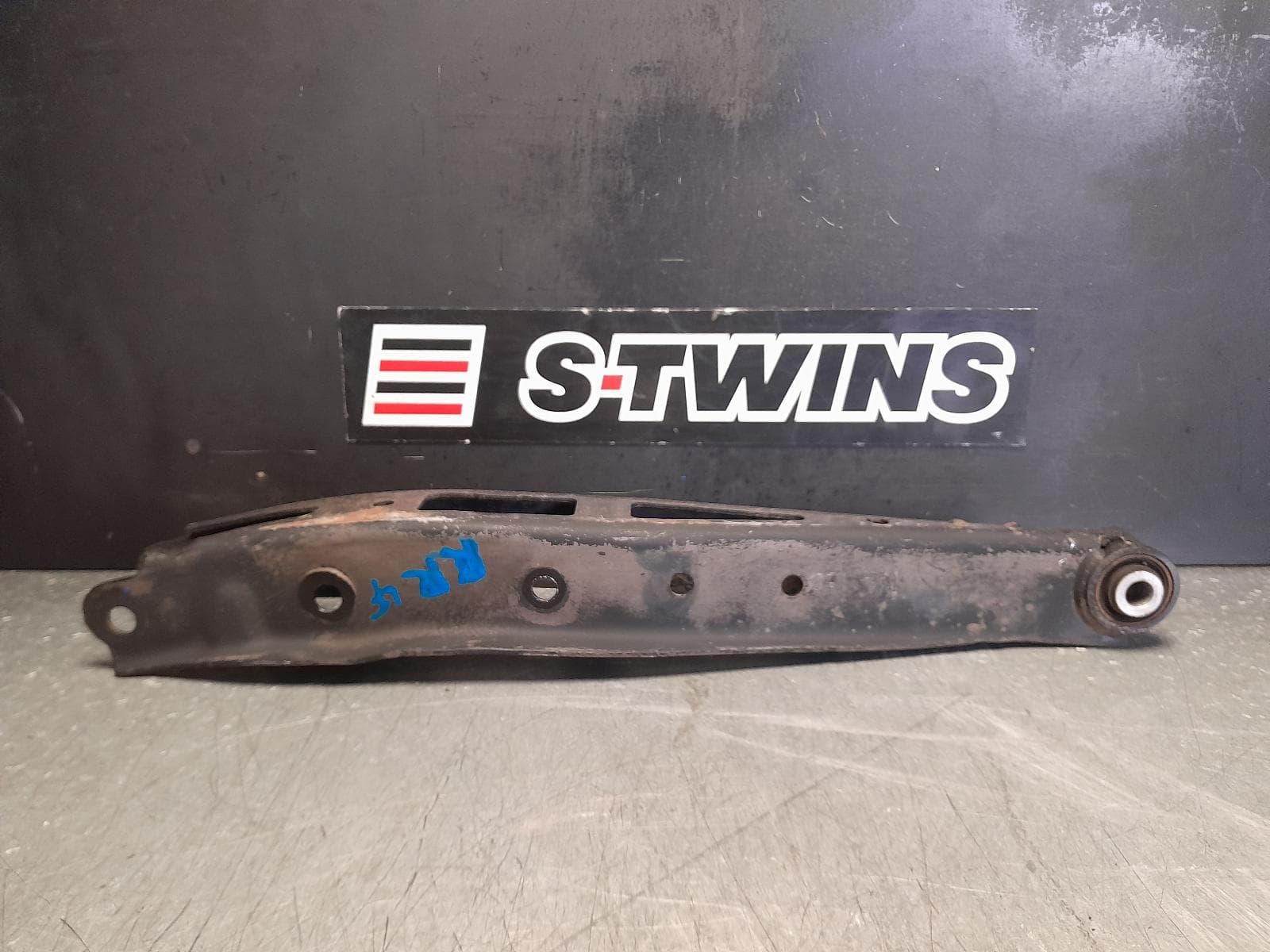 Used auto part listing image: 2015 SUBARU WRX RIGHT REAR TRAILING ARM LOWER CONTROL ARM-FRONT, V1, 03/14-10/21 0000347194