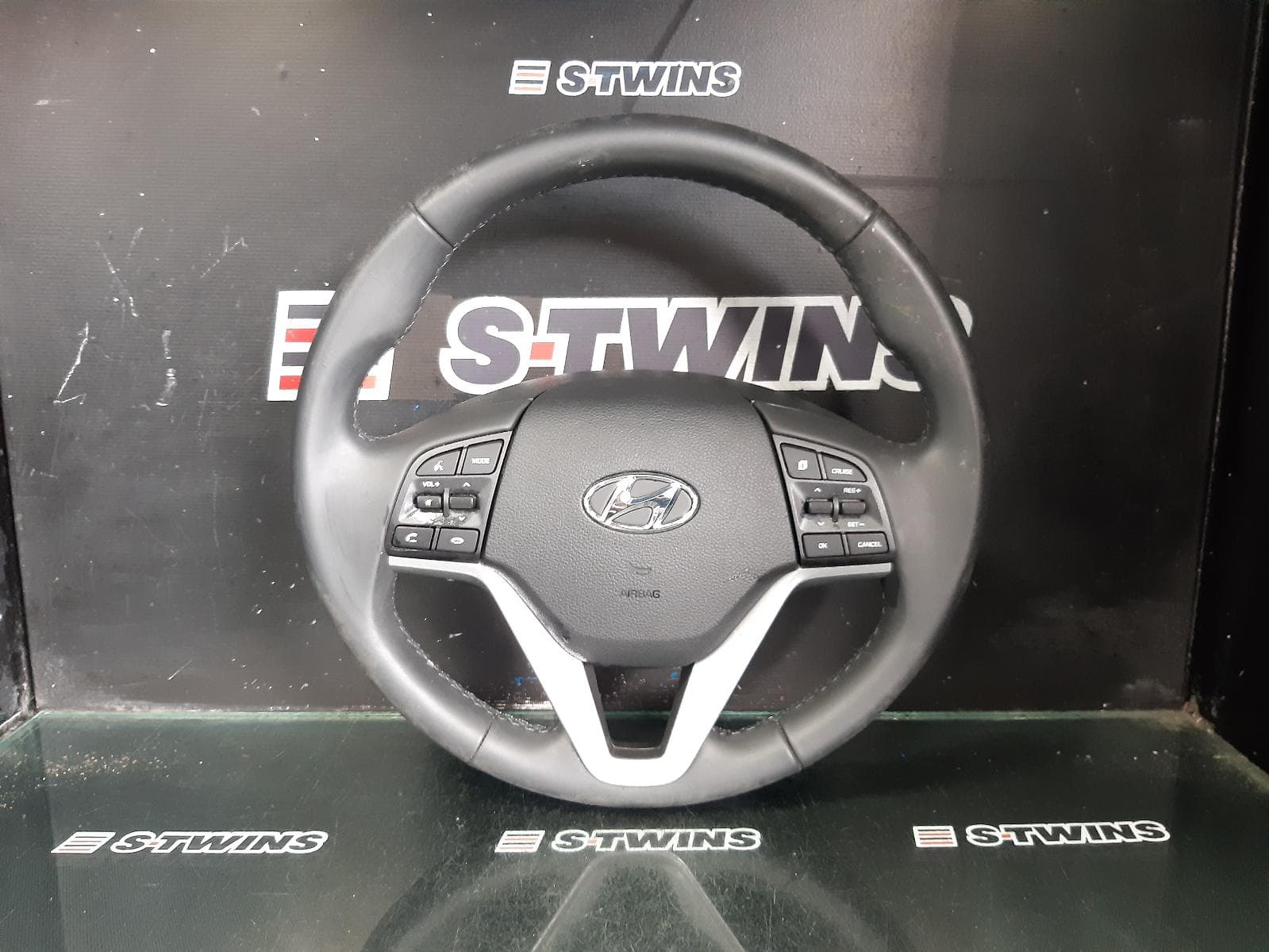 Used auto part listing image: 2020 HYUNDAI TUCSON STEERING WHEEL LEATHER, TL, W/ STD CRUISE CONTROL, PHONE & VOICE CONTROL, 08/18-01/21 0000306445