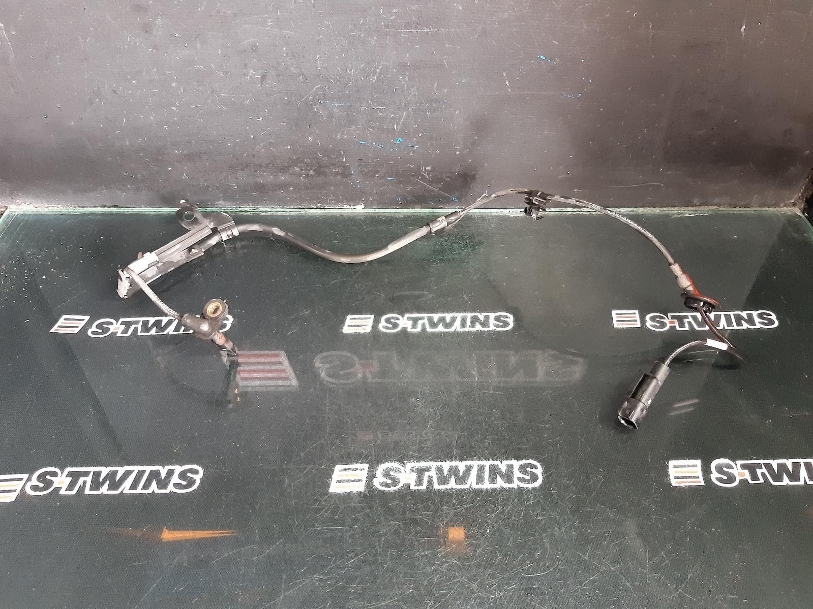 Used auto part listing image: 2008 MITSUBISHI LANCER ABS SENSOR LH FRONT, CJ, 07/07-10/15 0000358270