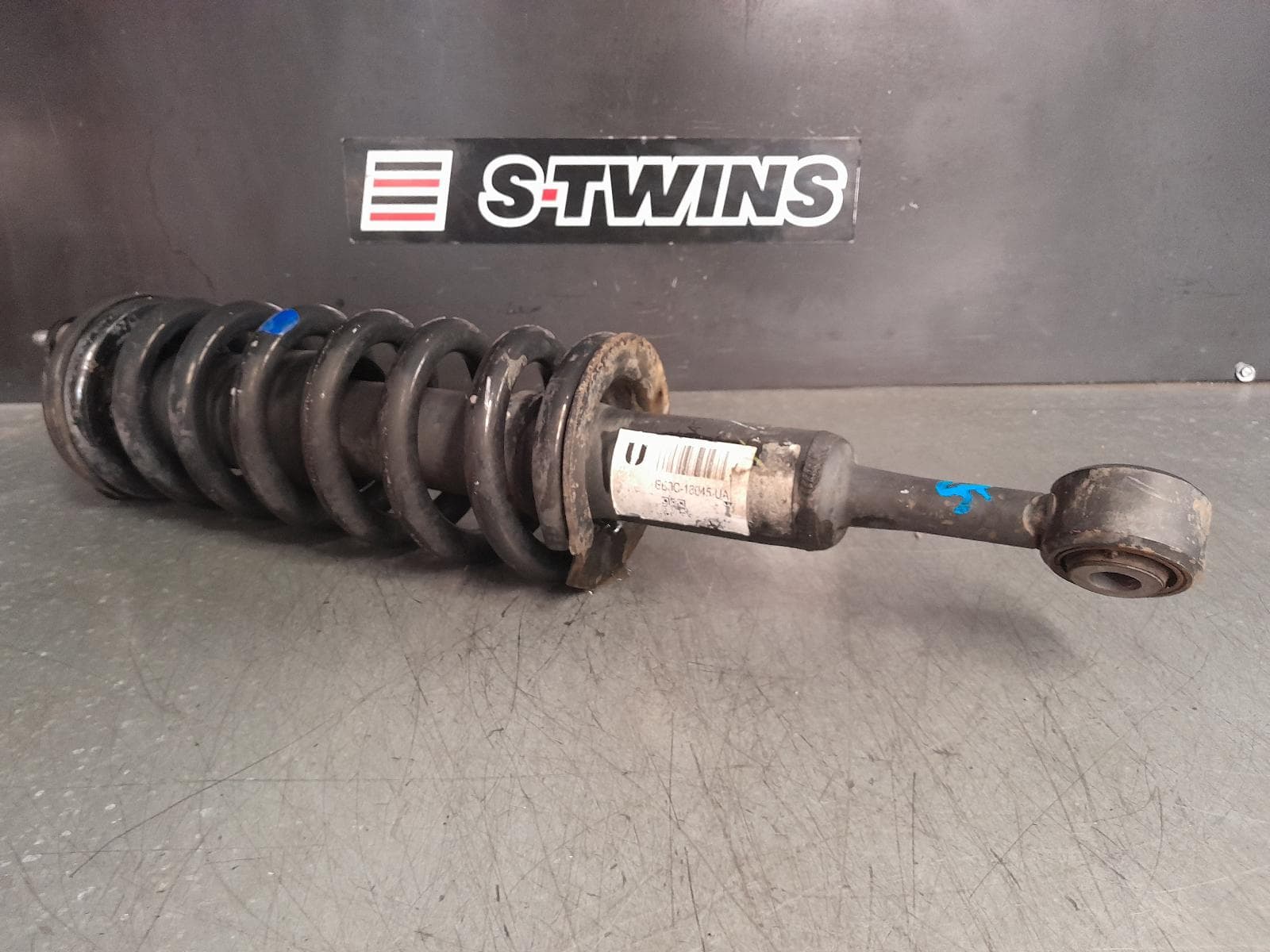 Used auto part listing image: 2015 MAZDA BT50 LEFT FRONT STRUT UP-UR, 2WD HIGH RIDE/4WD, 10/11-06/20 0000360171
