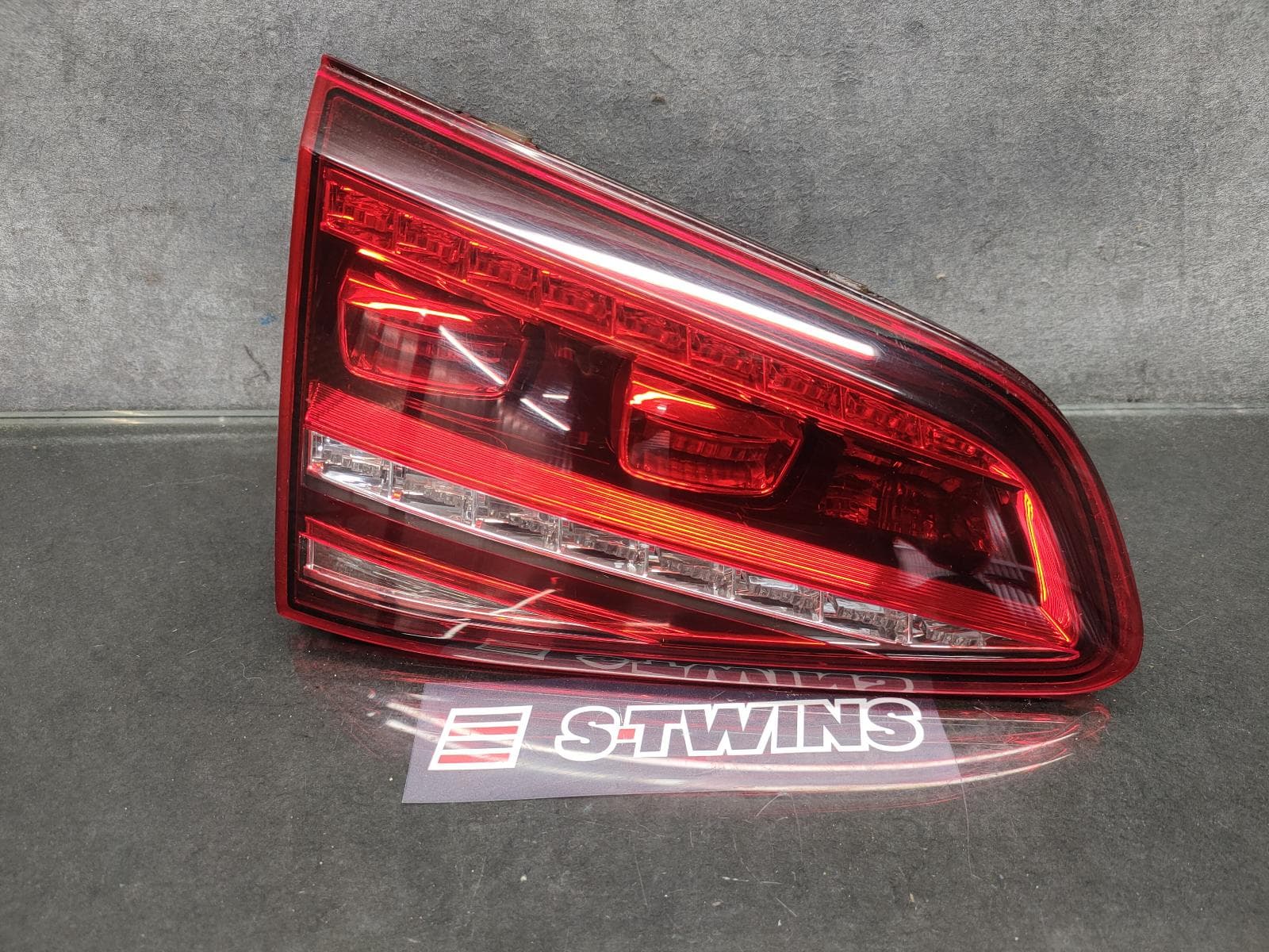 Used auto part listing image: 2014 VOLKSWAGEN GOLF REAR GARNISH TAILGATE LAMP (LH SIDE), GEN 7, GTi PERFORMANCE, 04/14-03/17 0000144093