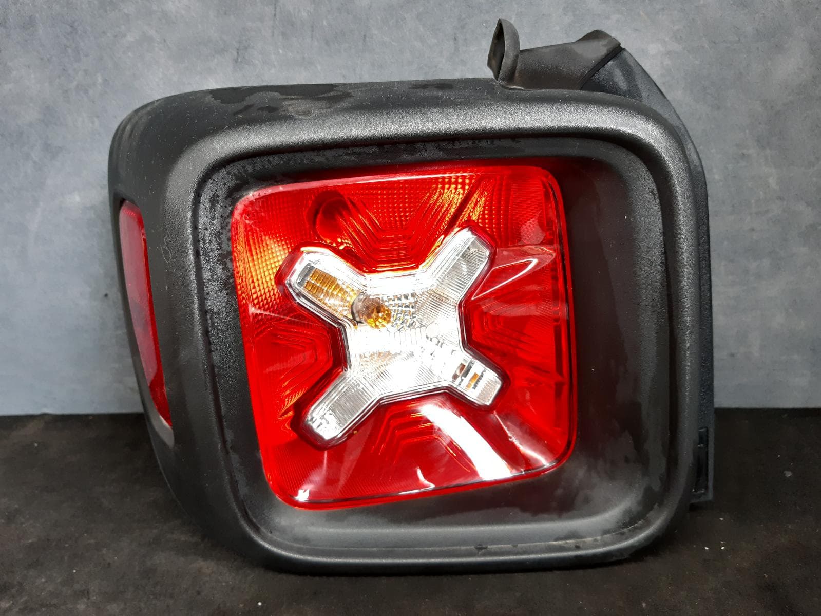 Used auto part listing image: 2016 JEEP RENEGADE LEFT TAILLIGHT BU, IN BODY, SPORT, 09/15-01/20 0000094259