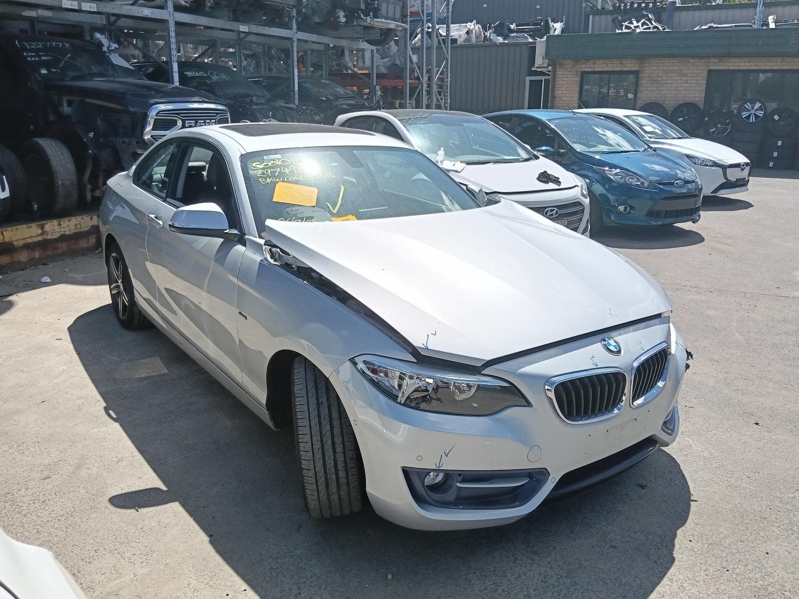 Featured wrecking vehicle: 2016 BMW 2 SERIES (stock 9427)