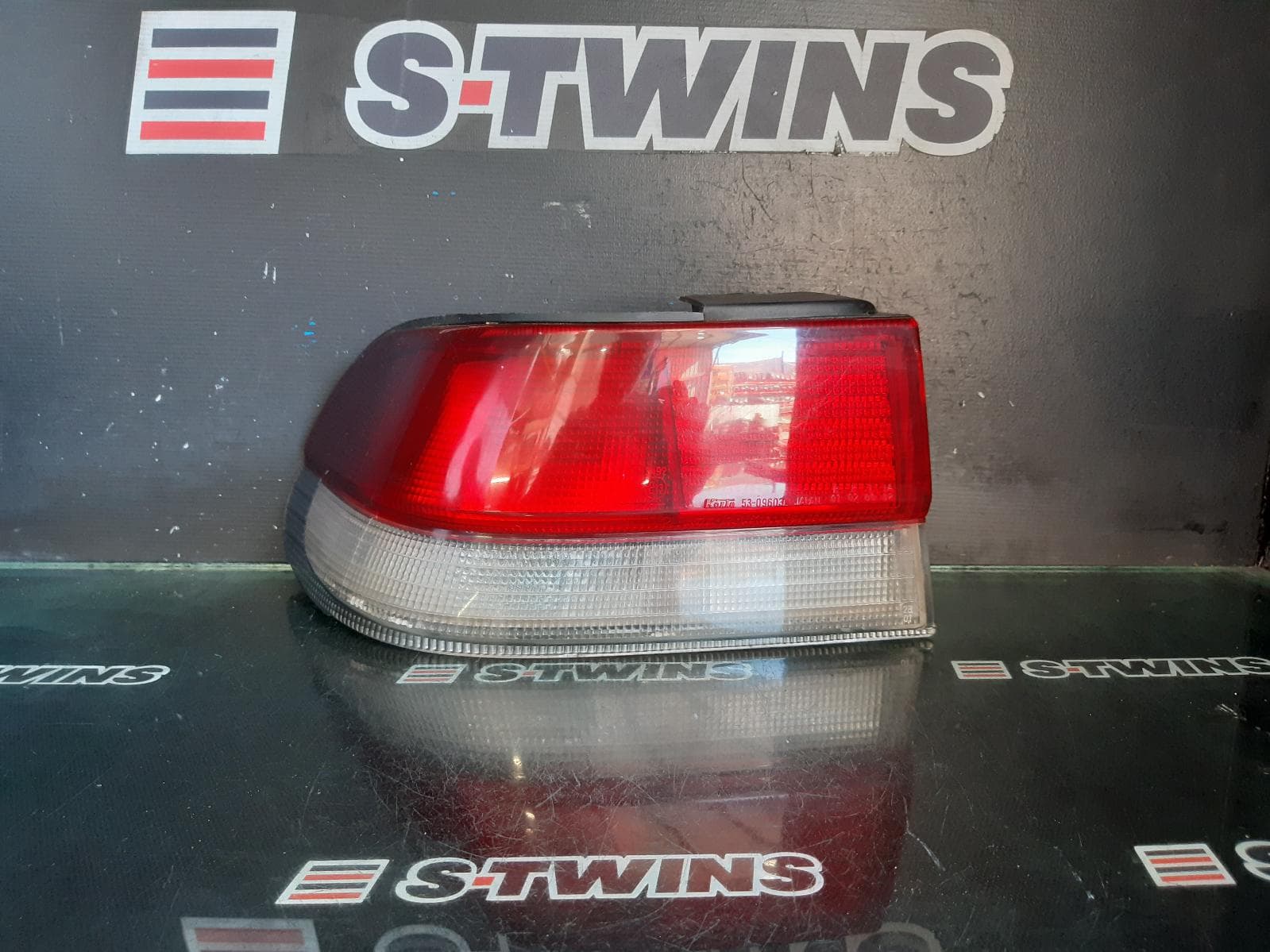 Used auto part listing image: 1995 SUBARU LIBERTY LEFT TAILLIGHT 2ND GEN, SEDAN, AUST TYPE, VIN JF1BD..., 06/94-01/99 0000169000