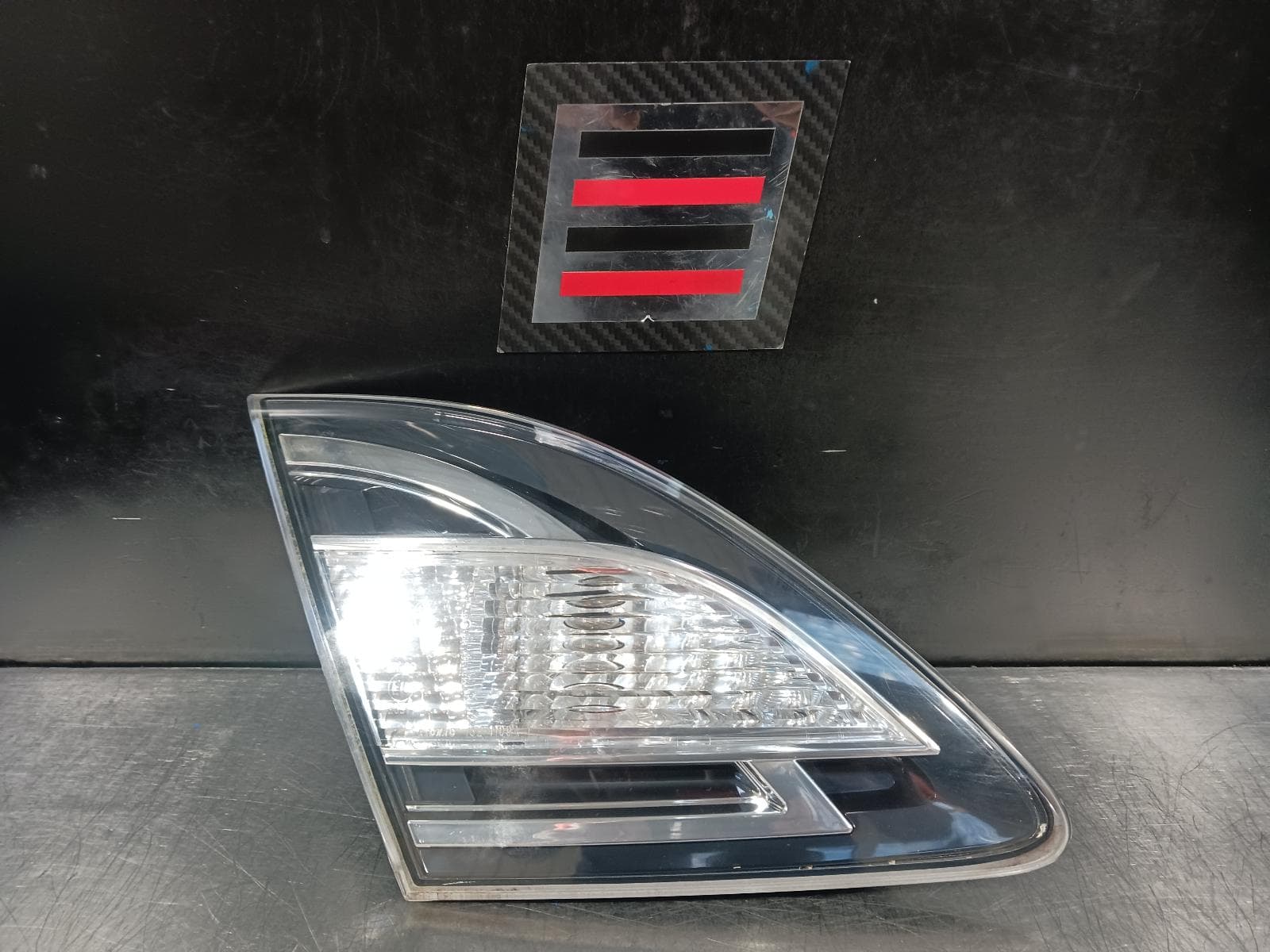Used auto part listing image: 2011 MAZDA 6 REAR GARNISH TAILGATE LAMP (LH SIDE), GH, WAGON, NON RED INSERT TYPE, 03/10-11/12 0000218210