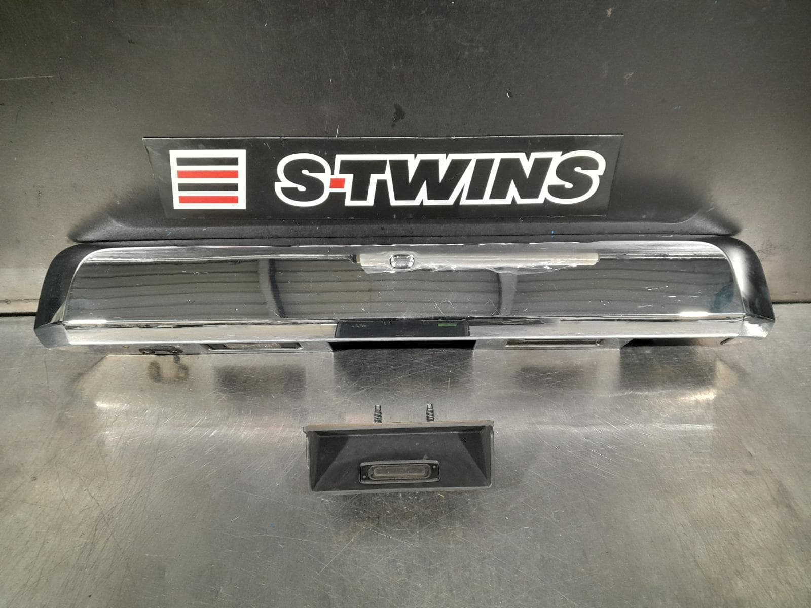 Used auto part listing image: 2010 NISSAN PATHFINDER REAR GARNISH R51, W/ BUTTONS TYPE, 05/05-09/13 0000266077