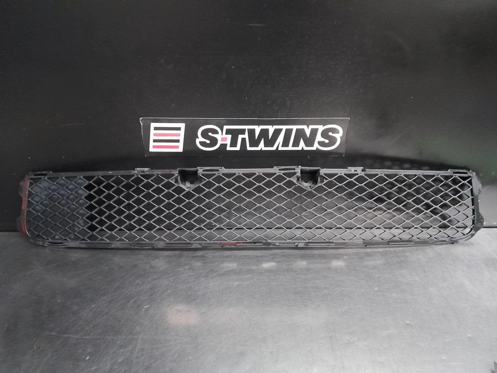 Used auto part listing image: 2010 MITSUBISHI LANCER GRILLE BUMPER GRILLE, CJ, BLACK, 07/07-10/15 0000279374