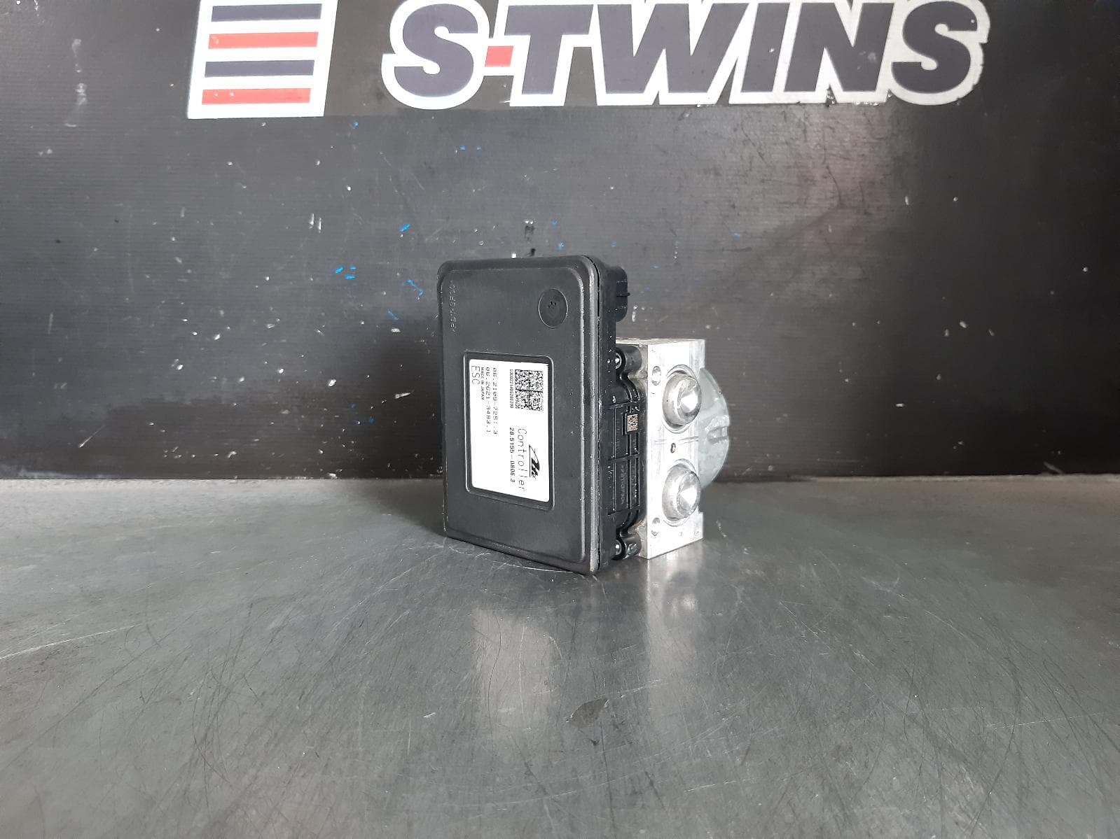 Used auto part listing image: 2014 SUBARU WRX ABS PUMP MODULATOR V1, P/N 27536VA001, 03/14-04/16 0000311795