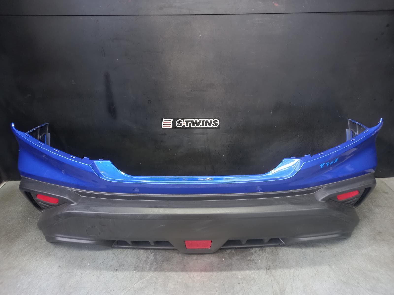 Used auto part listing image: 2022 SUBARU WRX REAR BUMPER BUMPER BAR (2 PIECE), W/ PARK SENSOR TYPE, SEDAN, VB, 12/21- 0000348700