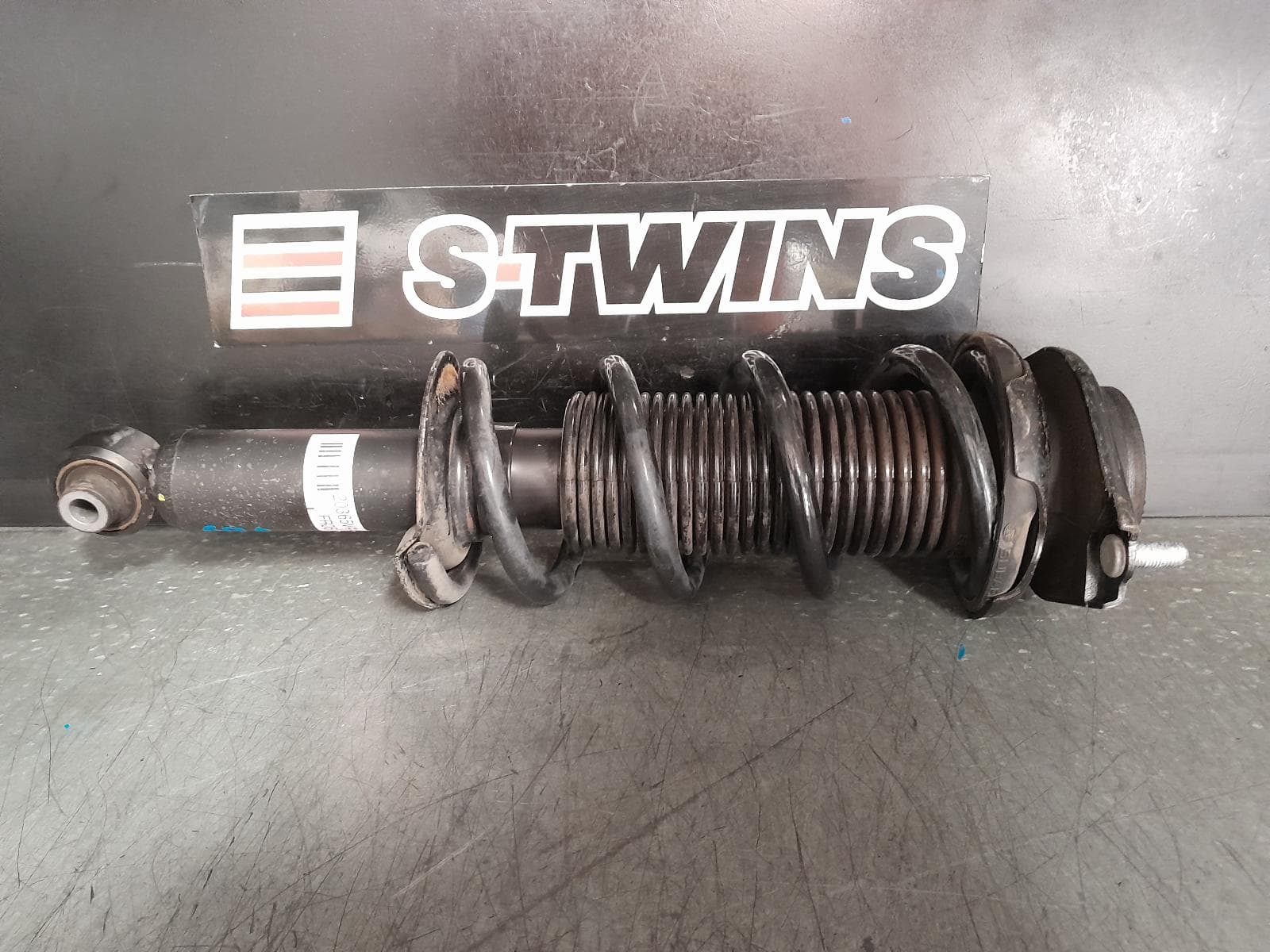 Used auto part listing image: 2017 SUBARU WRX LEFT FRONT STRUT V1, MANUAL T/M, STi, 03/14-10/21 0000365981