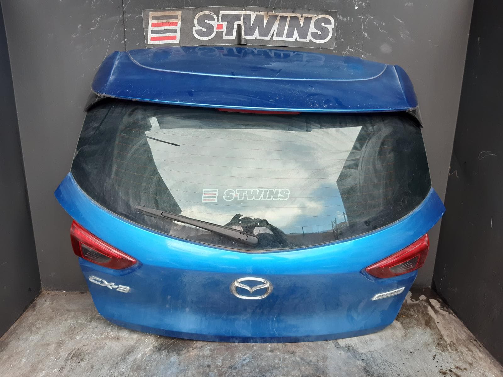 Used auto part listing image: 2016 MAZDA CX3 BOOTLID TAILGATE TAILGATE, DK, NON CAMERA TYPE, 03/15-05/18 0000364240