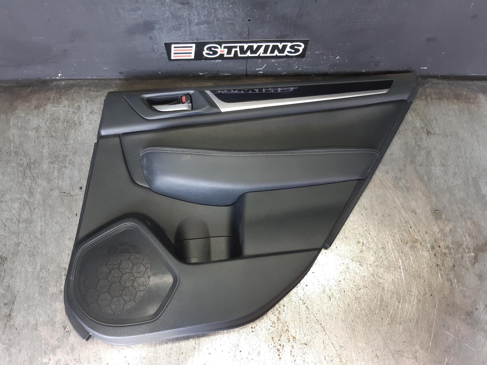 Used auto part listing image: 2015 SUBARU LIBERTY DOOR TRIM RH REAR, 6TH GEN, LEATHER, 08/14-04/21 0000364710