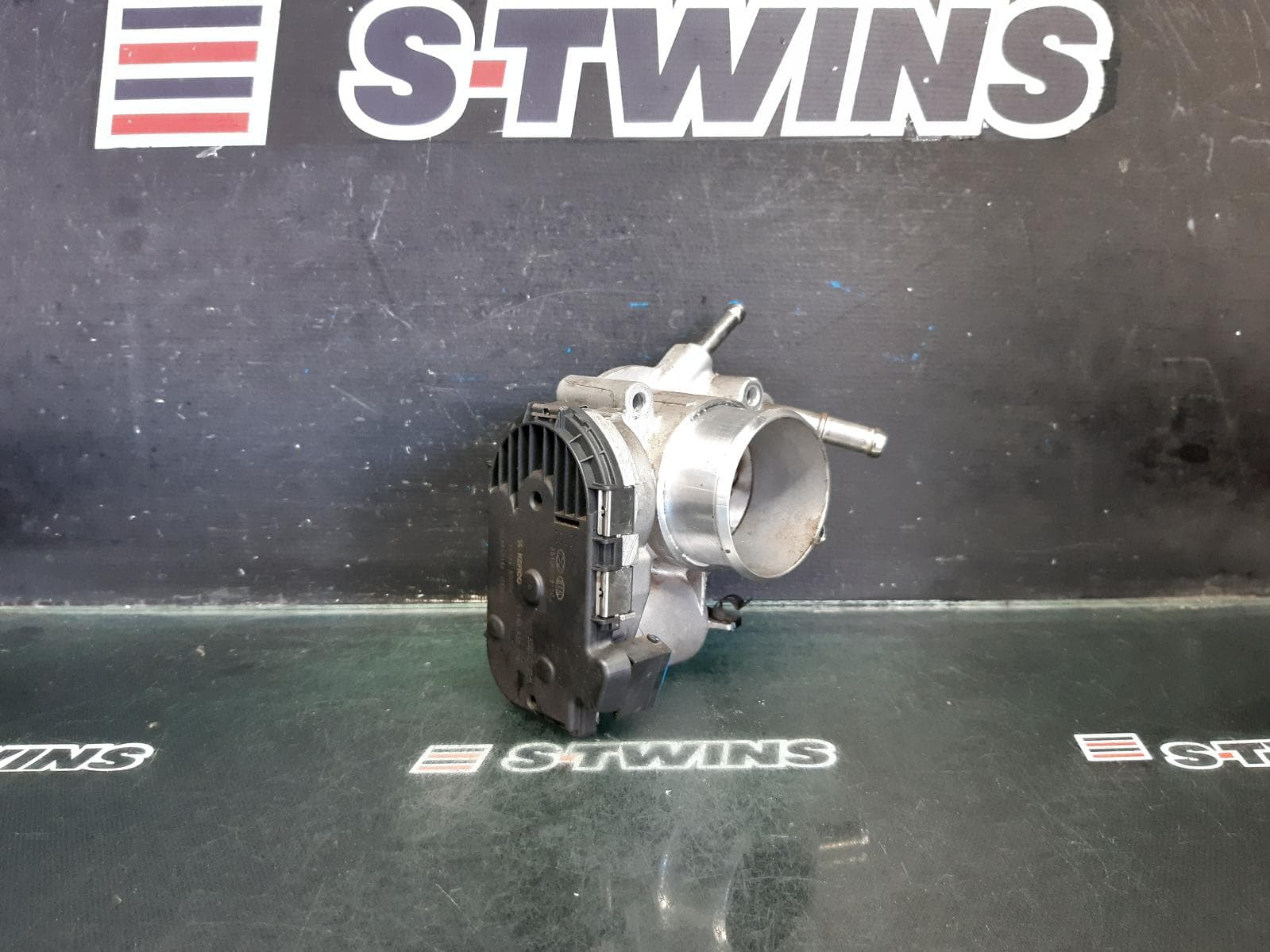 Used auto part listing image: 2015 HYUNDAI I20 THROTTLE BODY 1.4, G4FA, PB, 03/12-12/15 0000367653