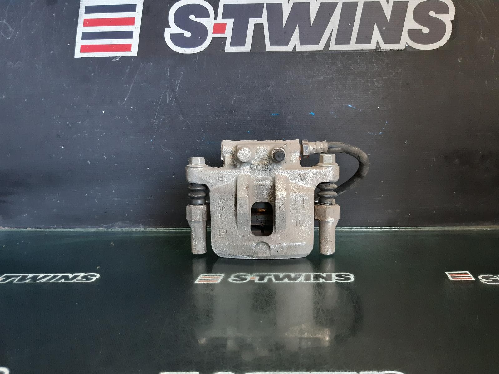 Used auto part listing image: 2017 MITSUBISHI LANCER CALIPER RH REAR, CF, 11/15-12/17 0000369178