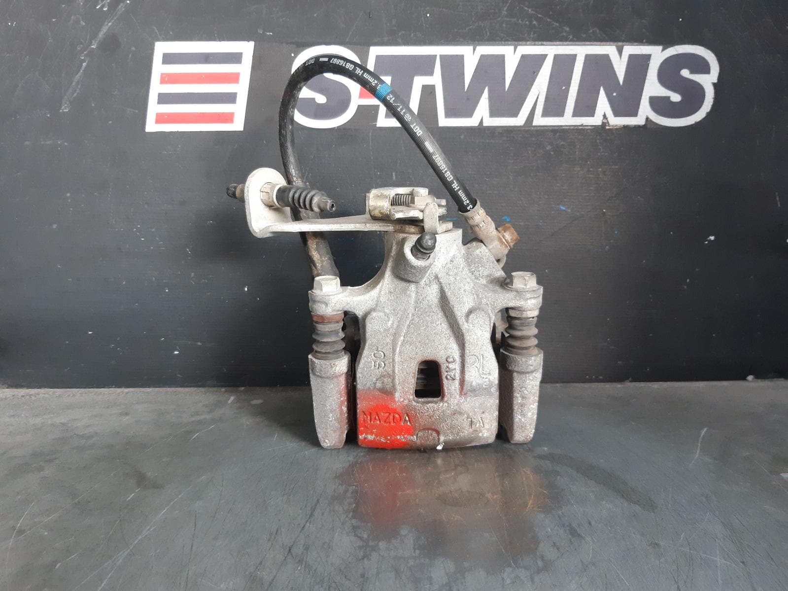 Used auto part listing image: 2012 MAZDA CX5 CALIPER LH REAR, 4WD, MECHANICAL TYPE, KE, 02/12-12/16 0000376537