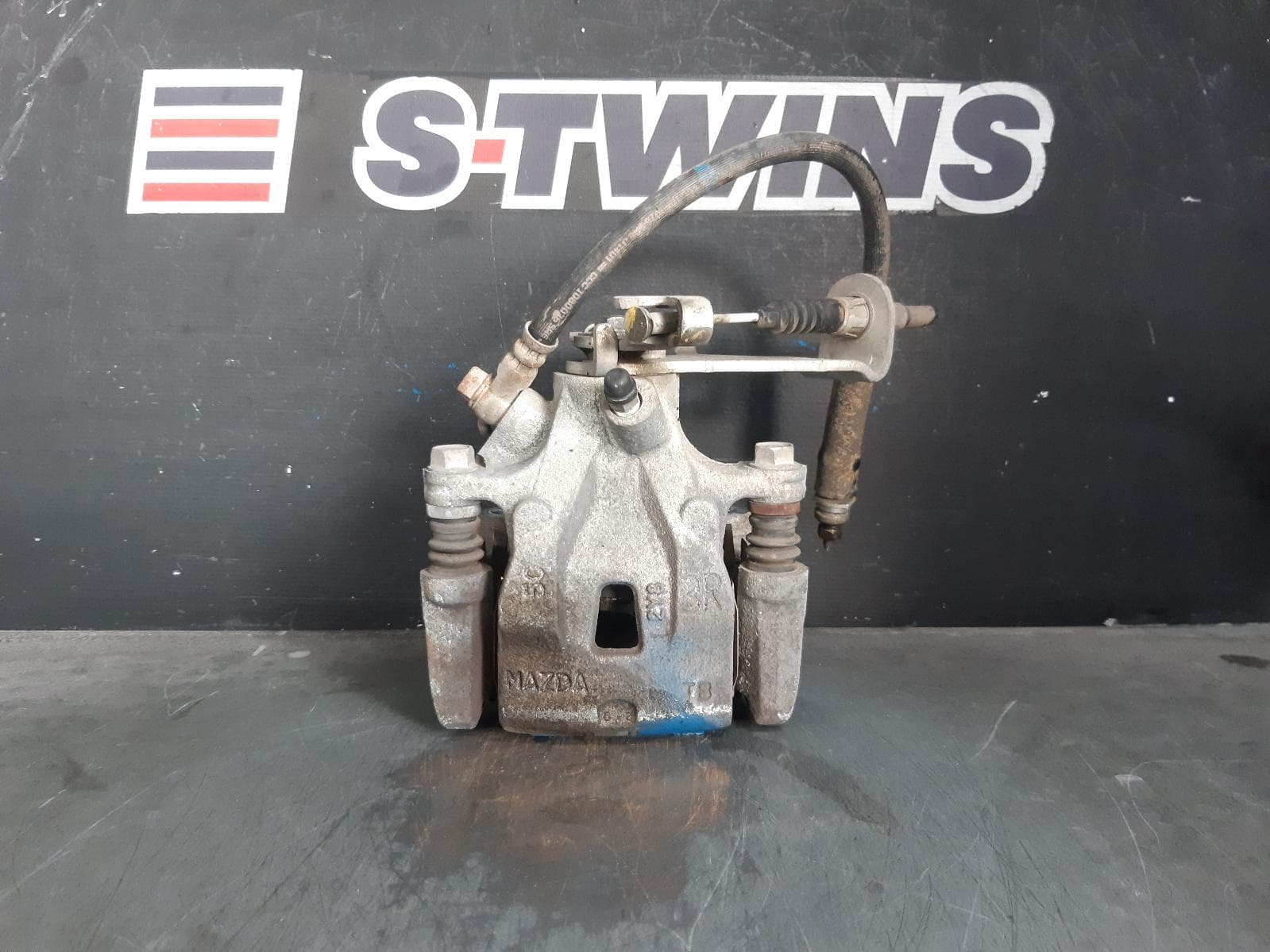 Used auto part listing image: 2012 MAZDA CX5 CALIPER RH REAR, 4WD, MECHANICAL TYPE, KE, 02/12-12/16 0000376538