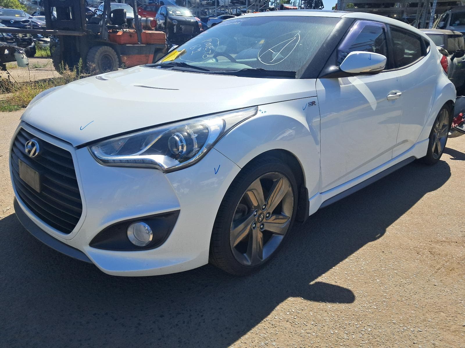 Featured wrecking vehicle: 2014 HYUNDAI VELOSTER (stock SPN474)