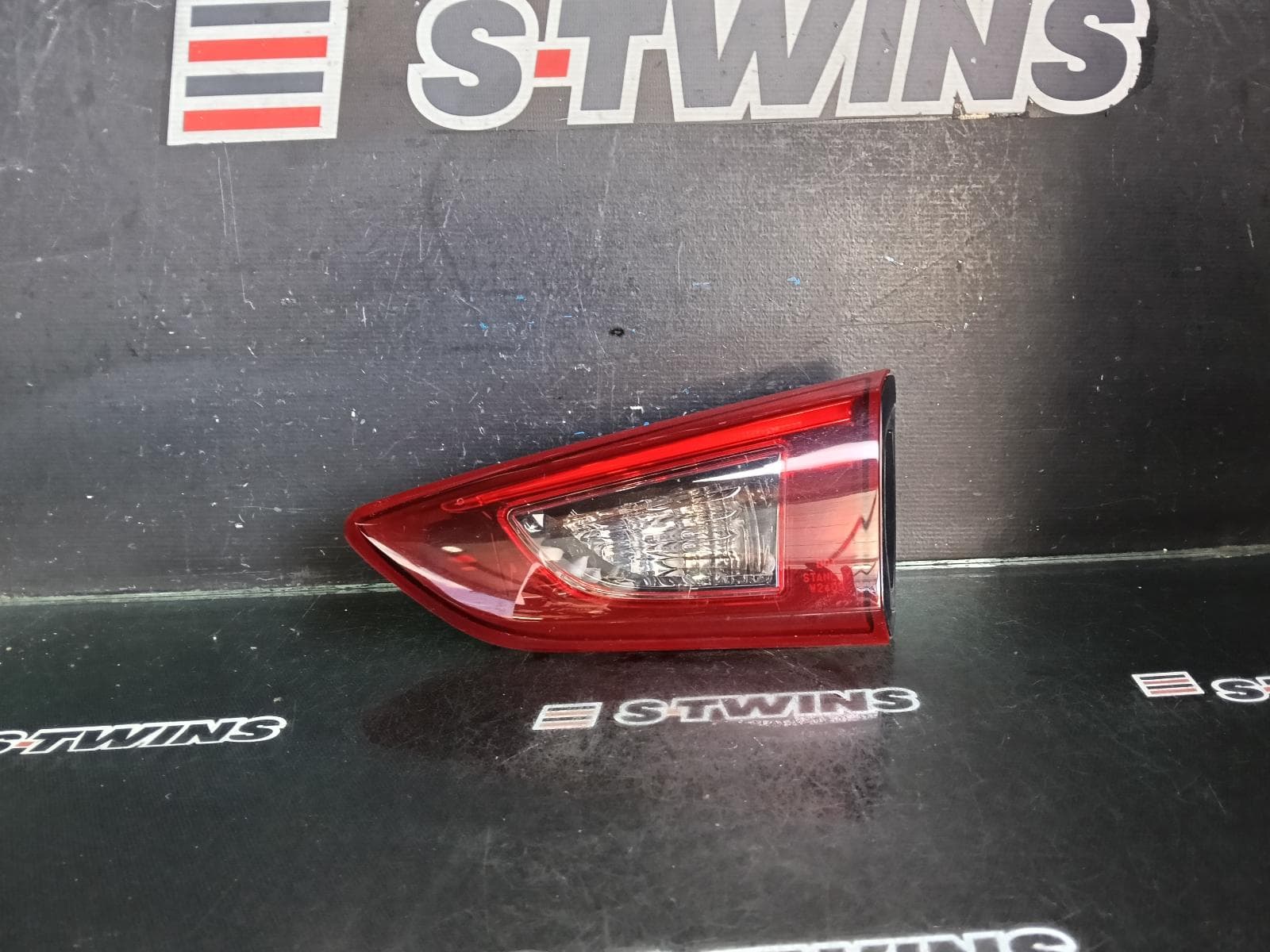 Used auto part listing image: 2016 MAZDA CX3 REAR GARNISH TAILGATE LAMP (RH SIDE), LED TYPE, DK, 03/15-05/18 0000382378