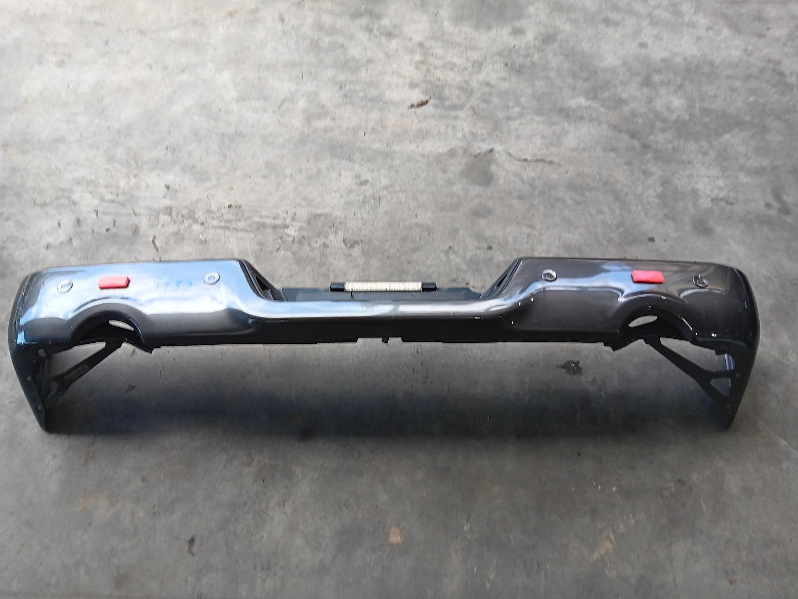 Used auto part listing image: 2021 RAM 1500 REAR BUMPER DS, COLOUR CODED, EXPRESS, 11/17-12/23 0000374989