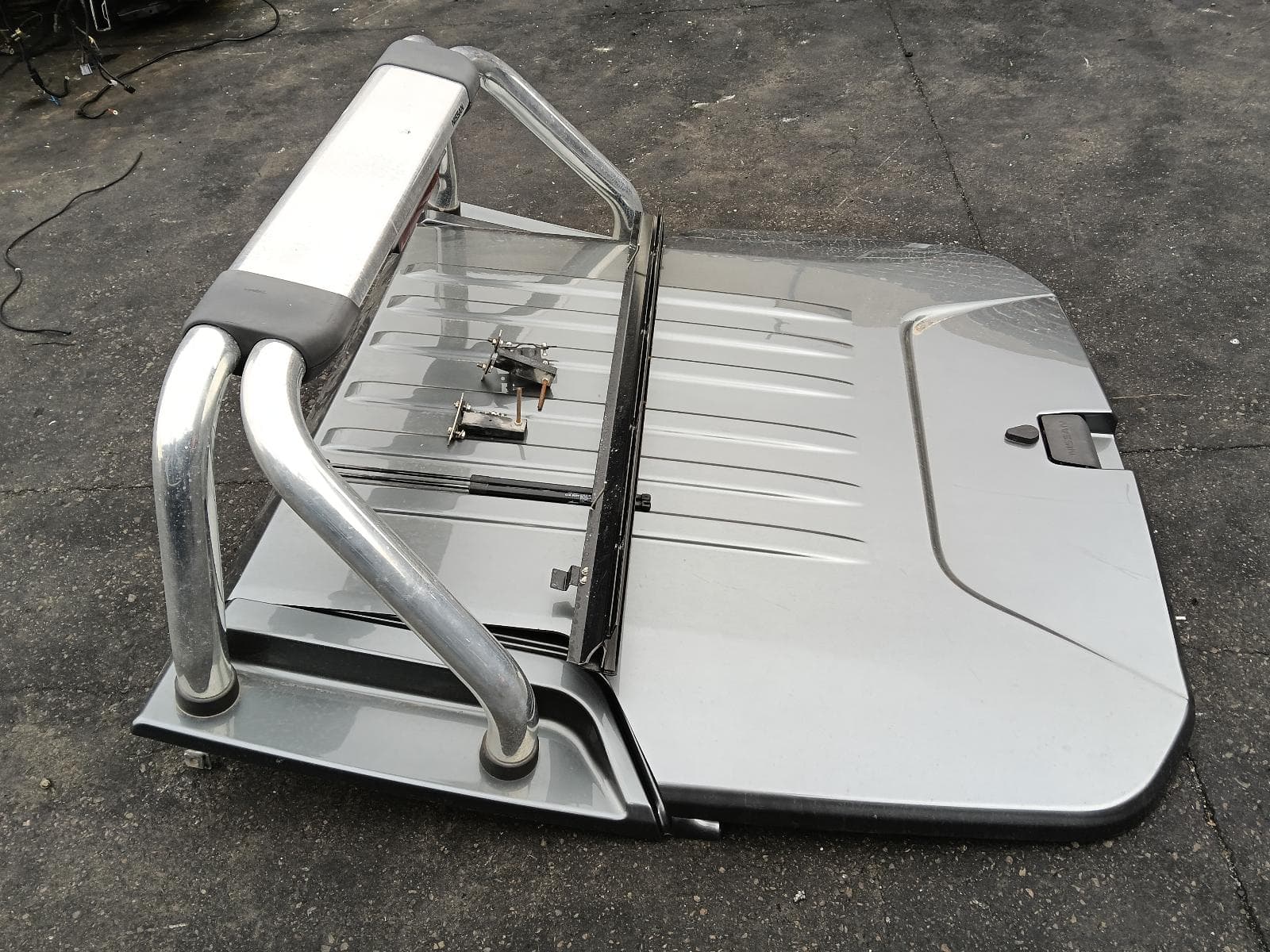 Used auto part listing image: 2020 NISSAN NAVARA TONNEAU COVER NP300, TONNEAU-HARD, DUAL CAB, 04/15- 0000385384