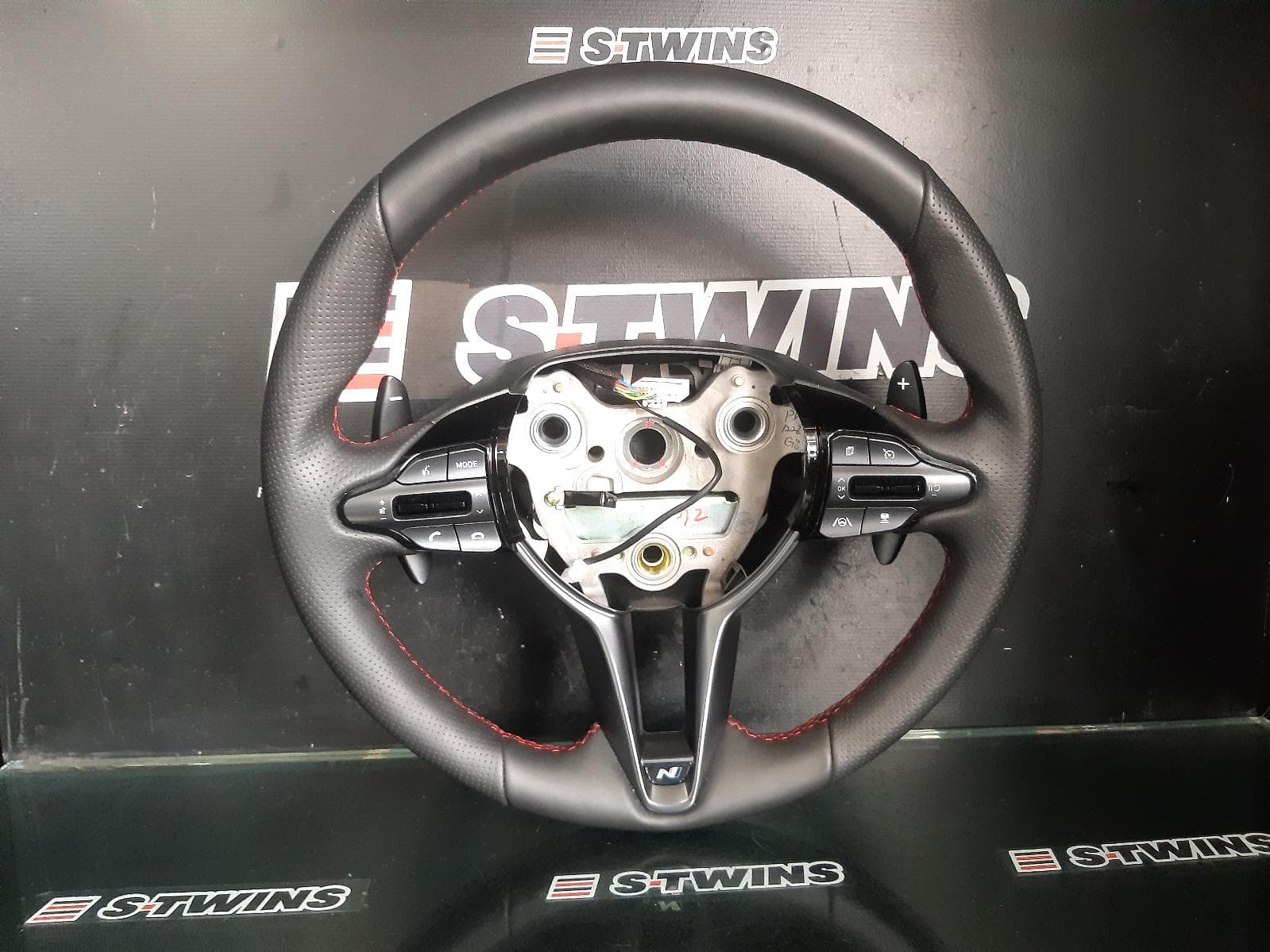 Used auto part listing image: NEW 2022 HYUNDAI I30 STEERING WHEEL LEATHER, PD, HATCH (S. KOREA VIN KMHH), W/ RED STITCH, PADDLE SHIFT TYPE, 03/17- 0000181655