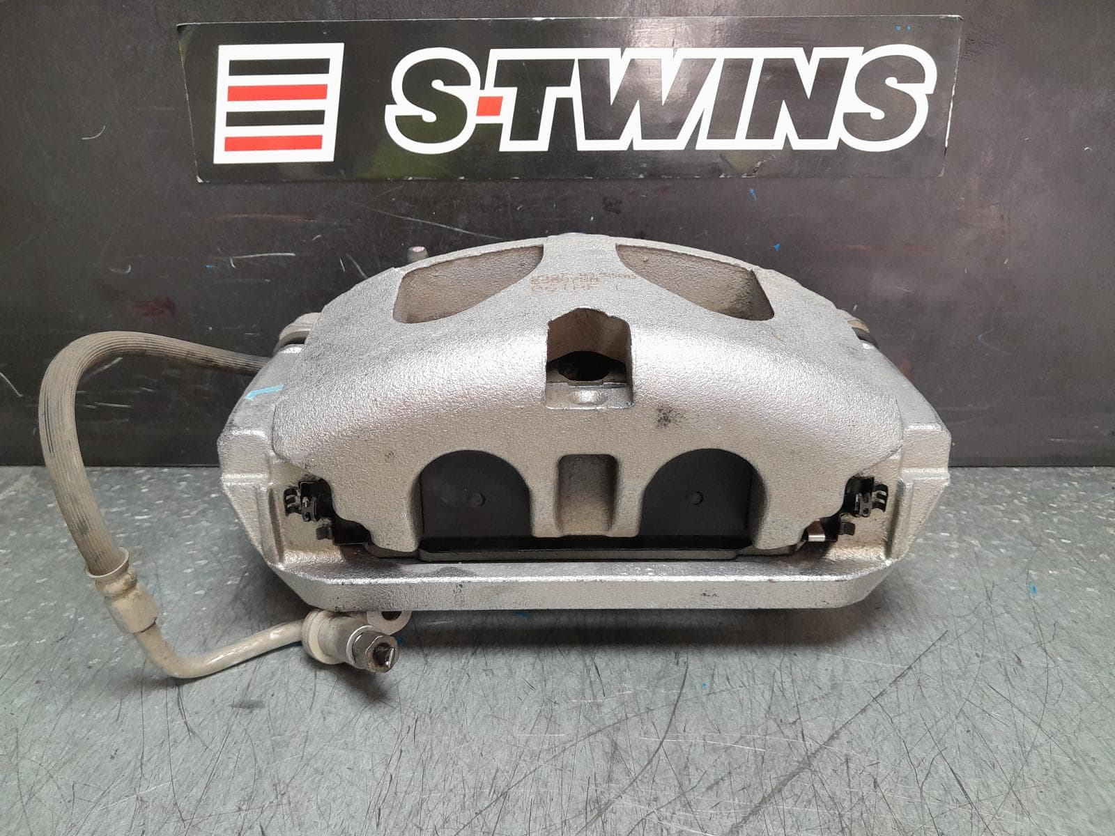 Used auto part listing image: 2021 RAM 1500 CALIPER LH FRONT, DT, 10/20- 0000368595