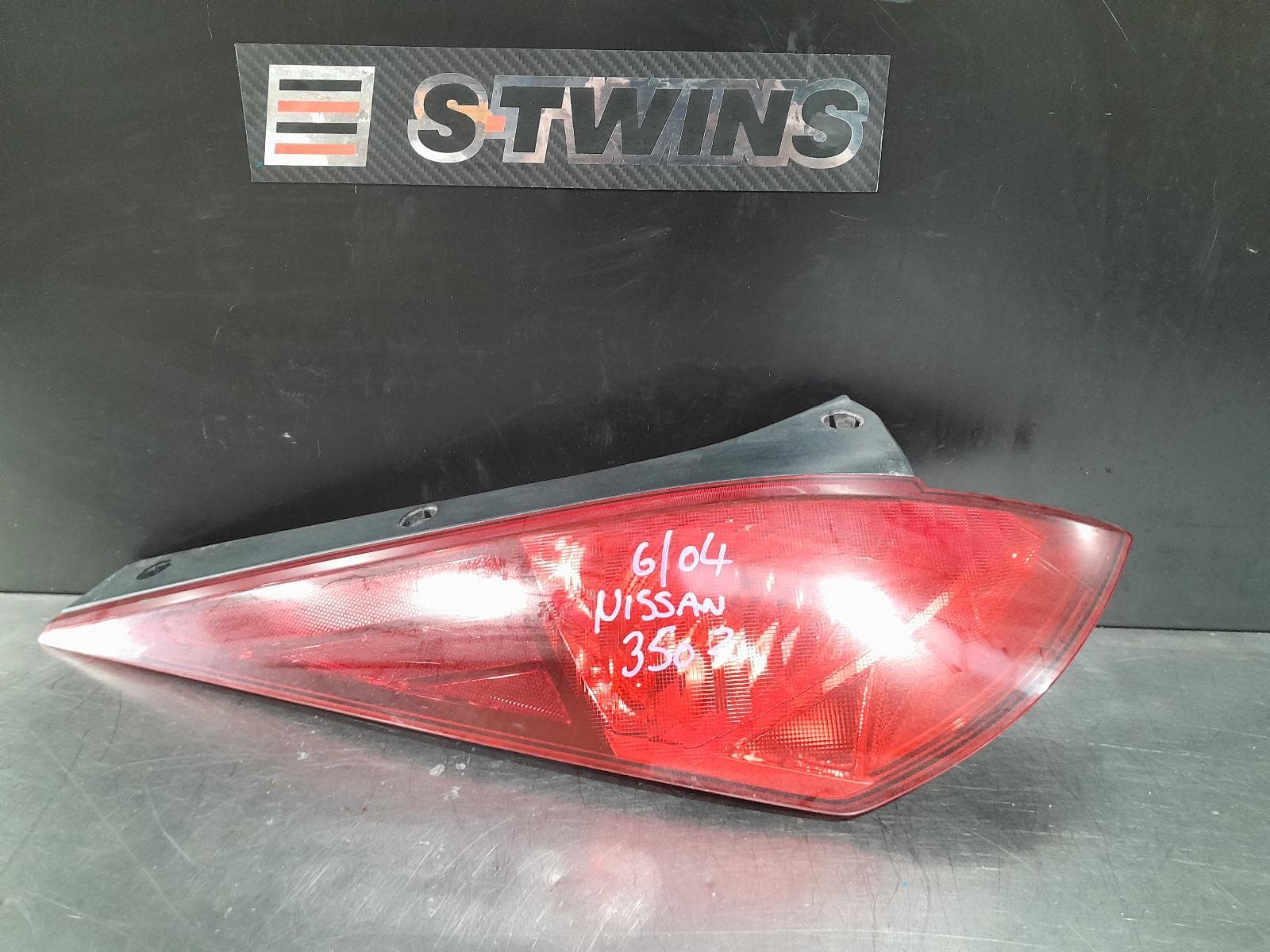 Used auto part listing image: 2005 NISSAN 350Z LEFT TAILLIGHT Z33, IN BODY, STD TYPE, 12/02-10/05 0000168455