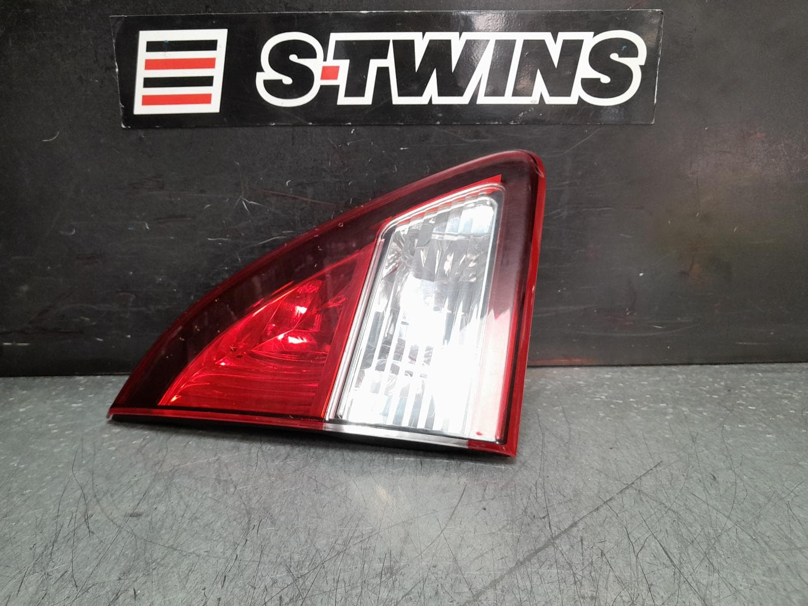 Used auto part listing image: 2015 MAZDA BT50 REAR GARNISH TAILGATE LAMP (LH SIDE), W/ RED SURROUND TYPE, UP-UR, 10/11-06/20 0000371507