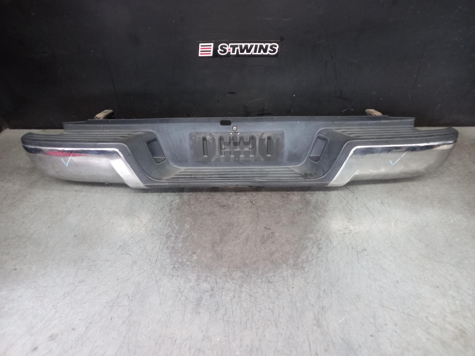 Used auto part listing image: 2014 MAZDA BT50 REAR BUMPER UP-UR, CHROME, NON PARK SENSORS, STEP TYPE, 10/11-06/20 0000389627