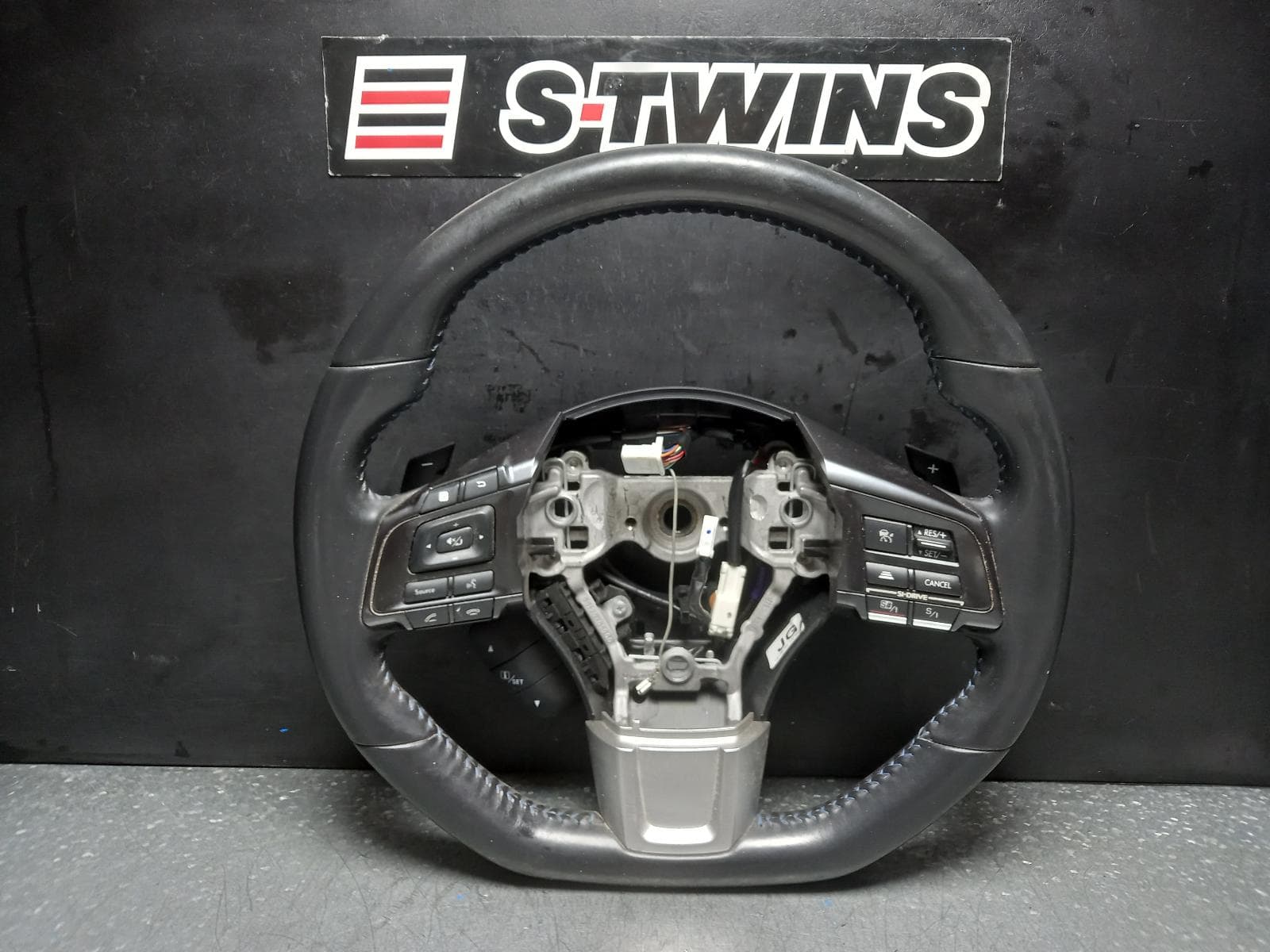Used auto part listing image: 2016 SUBARU LEVORG STEERING WHEEL V1, LEATHER, W/ Si DRIVE CONTROLS, 05/16-12/20 0000375986