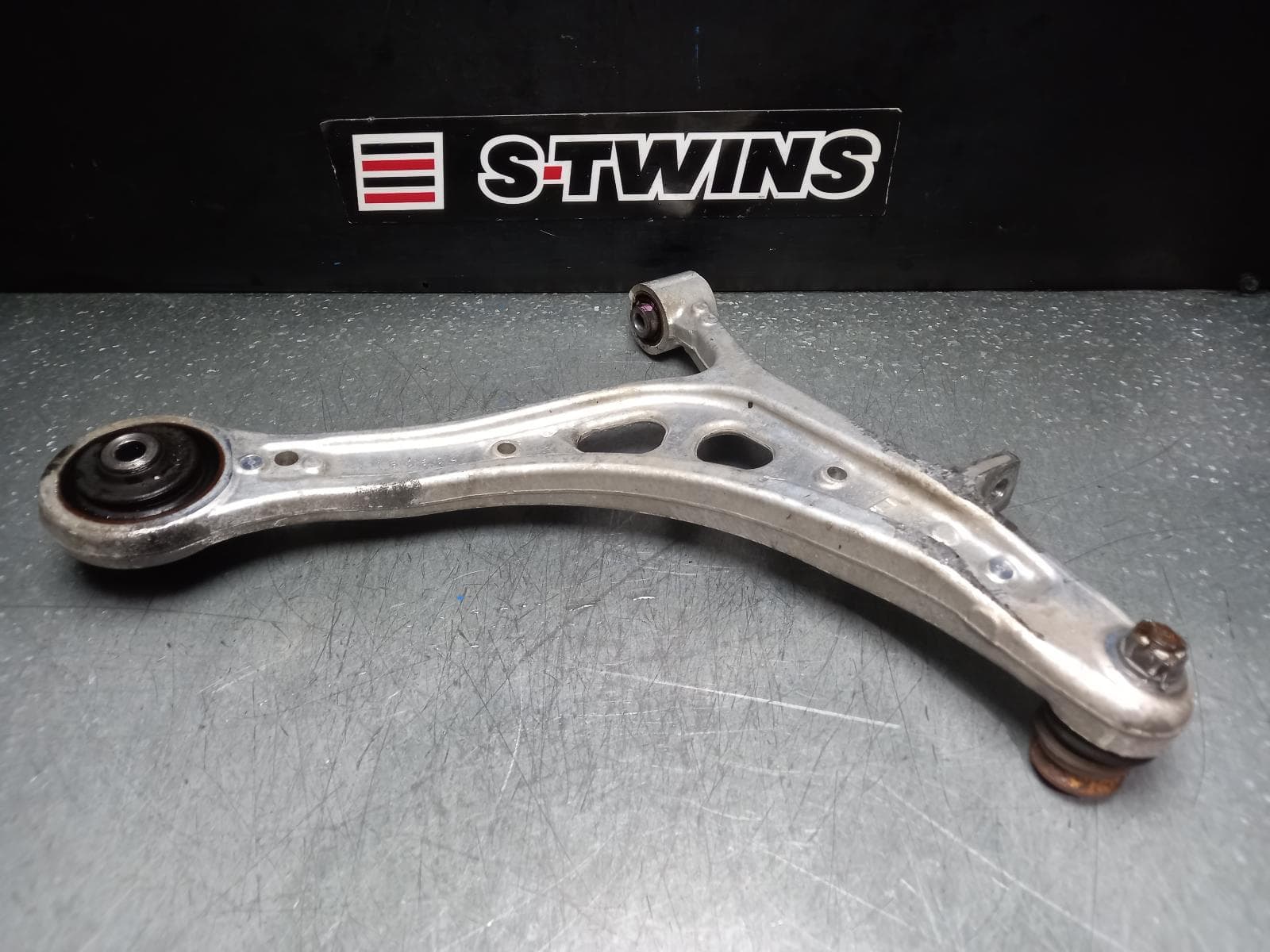 Used auto part listing image: 2016 SUBARU LEVORG LEFT FRONT LOWER CONTROL ARM V1, 05/16-12/20 0000375994