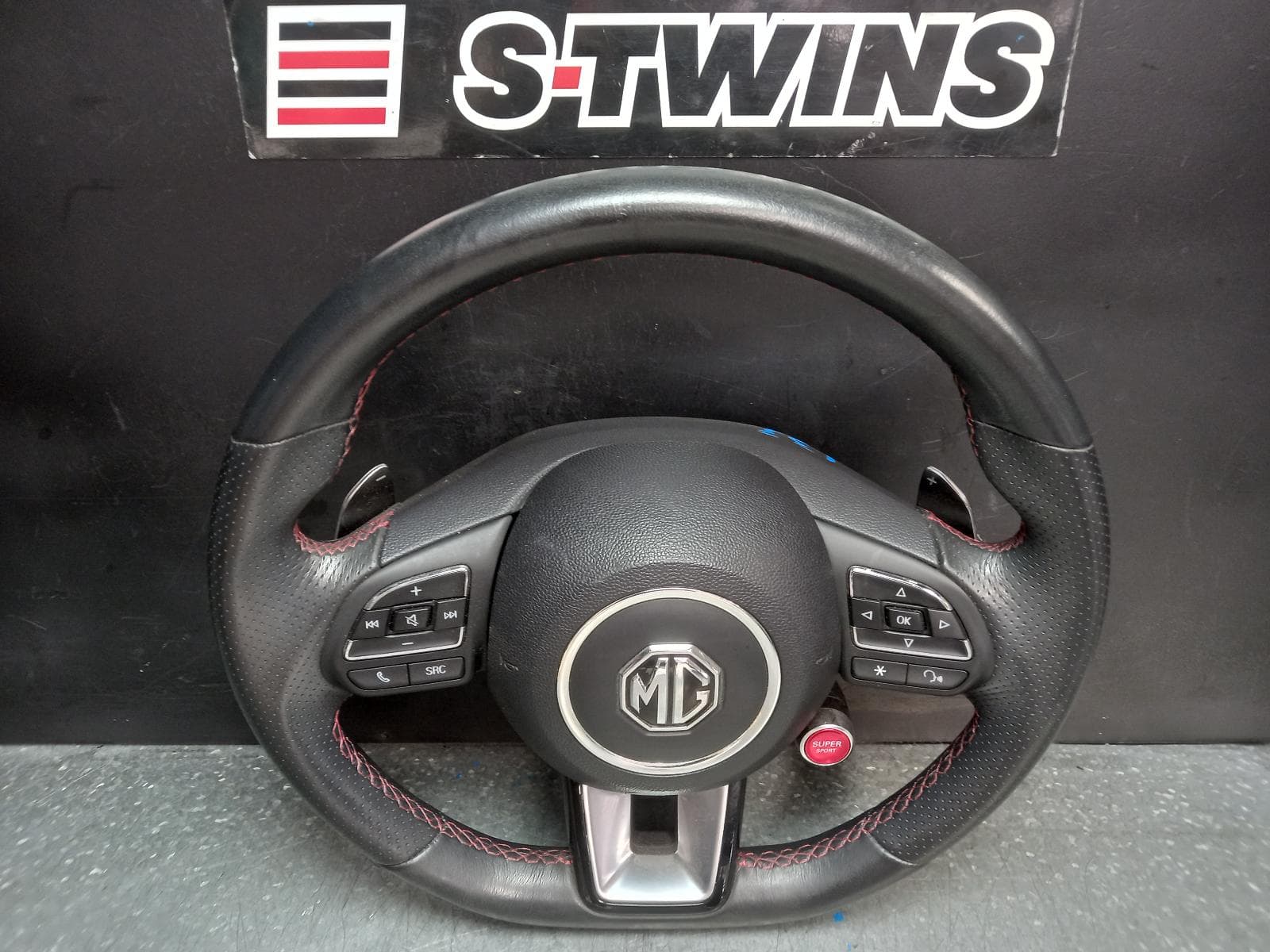 Used auto part listing image: 2020 MG HS STEERING WHEEL LEATHER, W/ PADDLE SHIFT & SUPER SPORT MODE BUTTON TYPE, SAS23, 09/19-12/24 0000374130