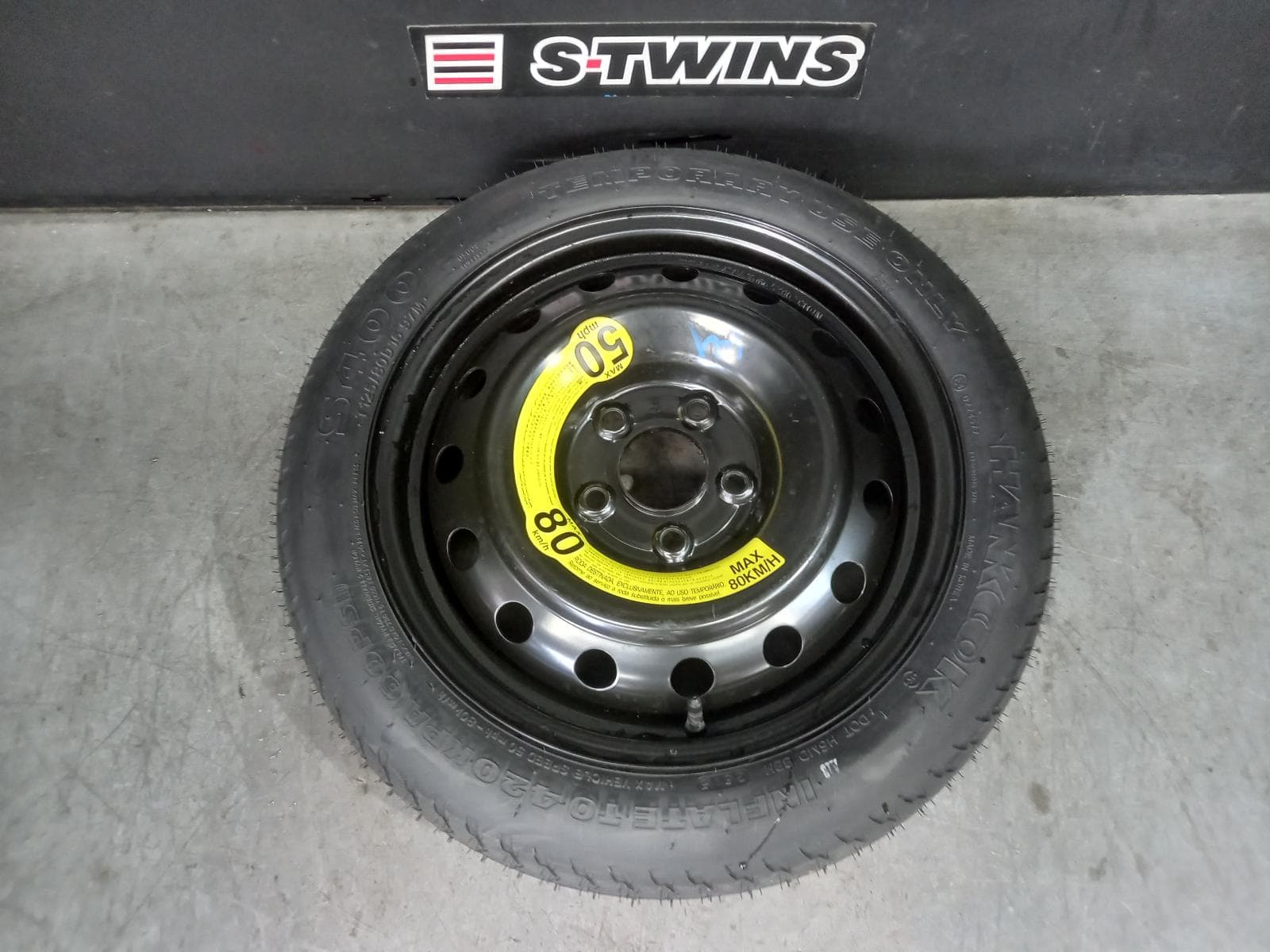 Used auto part listing image: 2015 HYUNDAI VELOSTER WHEEL STANDARD STEEL SPARE, FS, TURBO TYPE, 06/12-02/18 0000373928