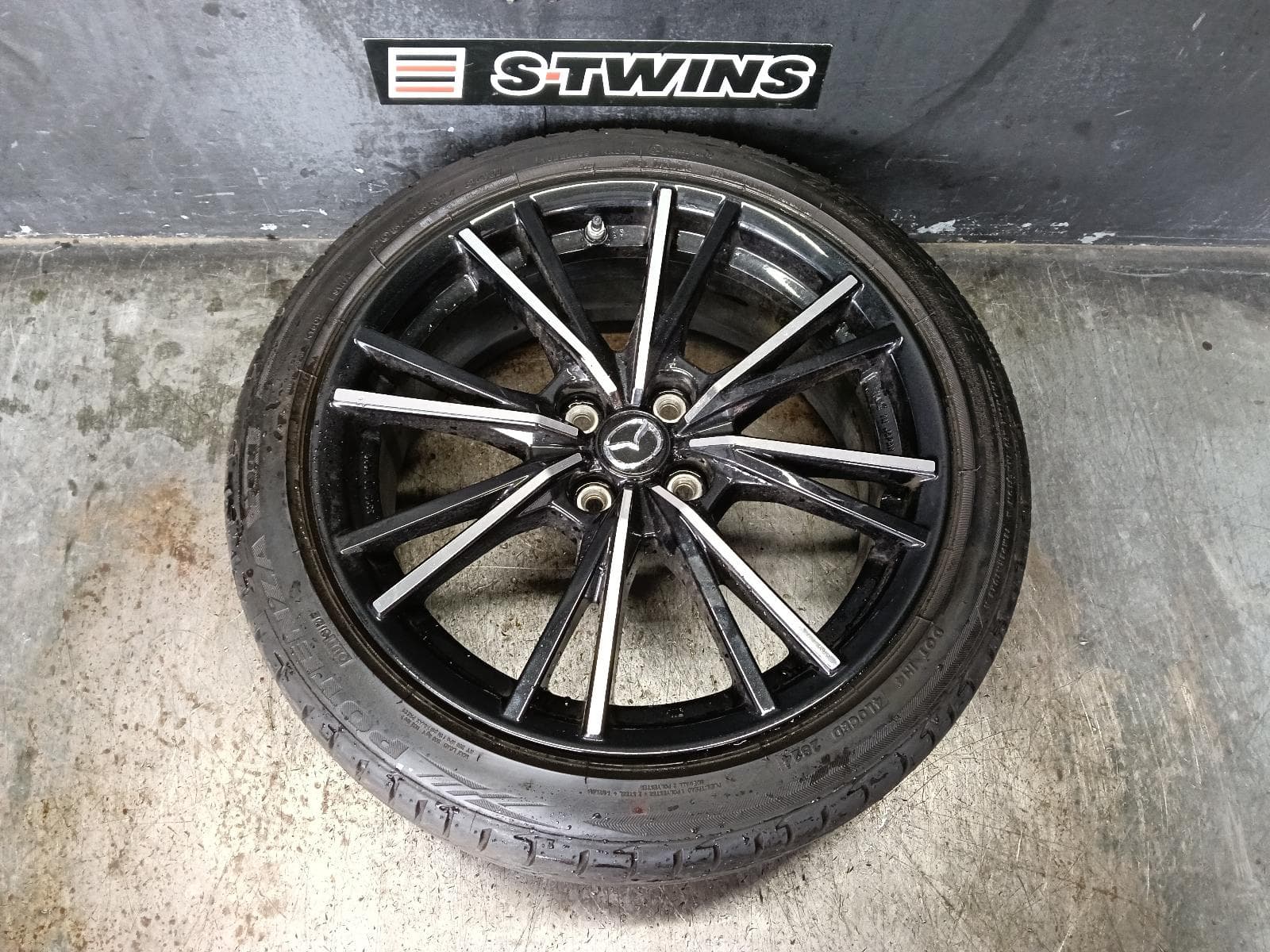 Used auto part listing image: 2024 MAZDA MX5 WHEEL MAG ND SERIES, FACTORY, 17X7IN, 8 V SPOKE, BI-COLOUR, 12/23- 0000388643