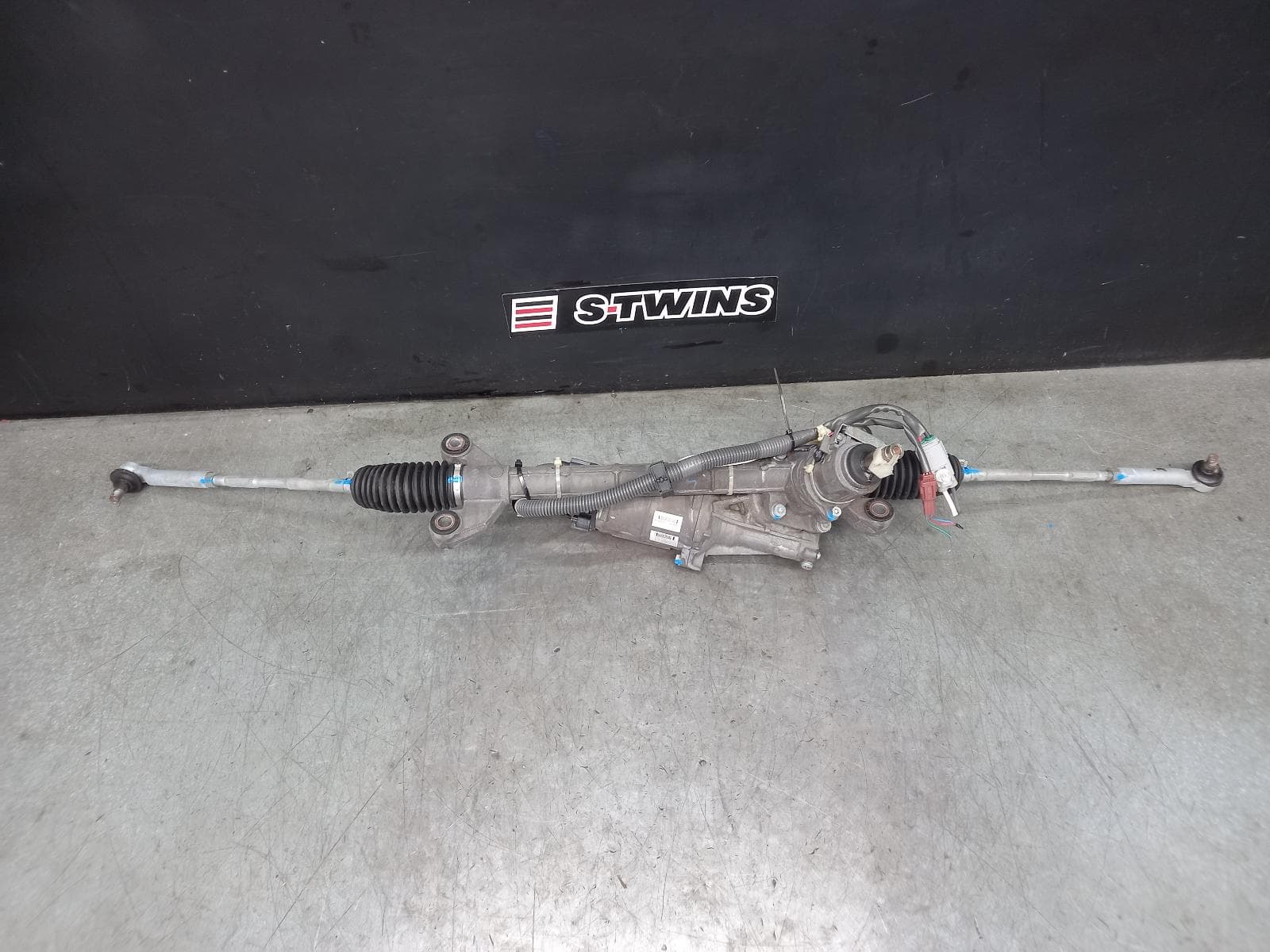 Used auto part listing image: 2017 SUBARU WRX STEERING BOX RACK V1, P/N 34110VA060, WRX, 05/17-10/21 0000383679