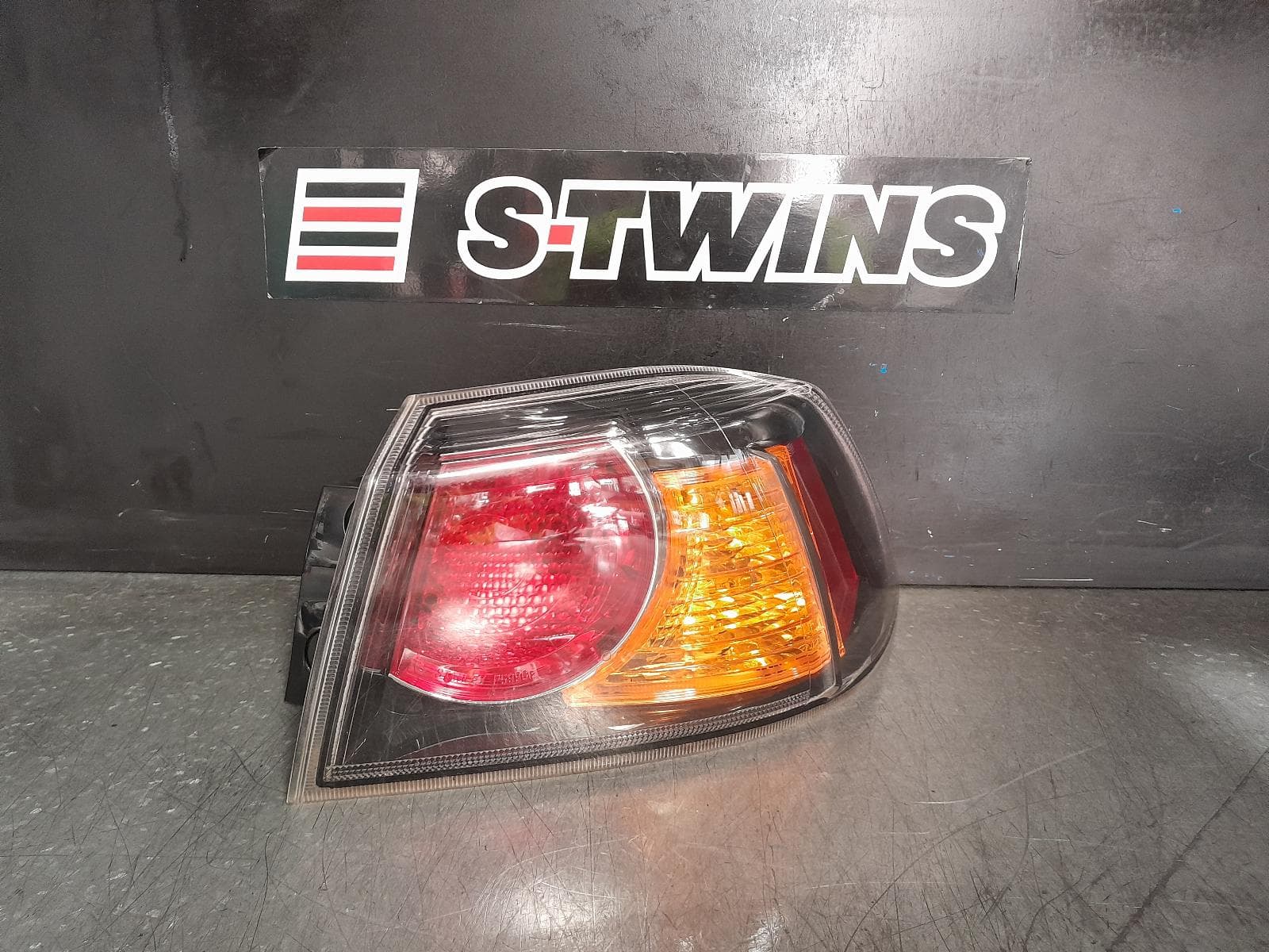 Used auto part listing image: 2011 MITSUBISHI LANCER RIGHT TAILLIGHT CJ-CF, SEDAN, BLACK INSERT TYPE, 07/07-12/17 0000366901