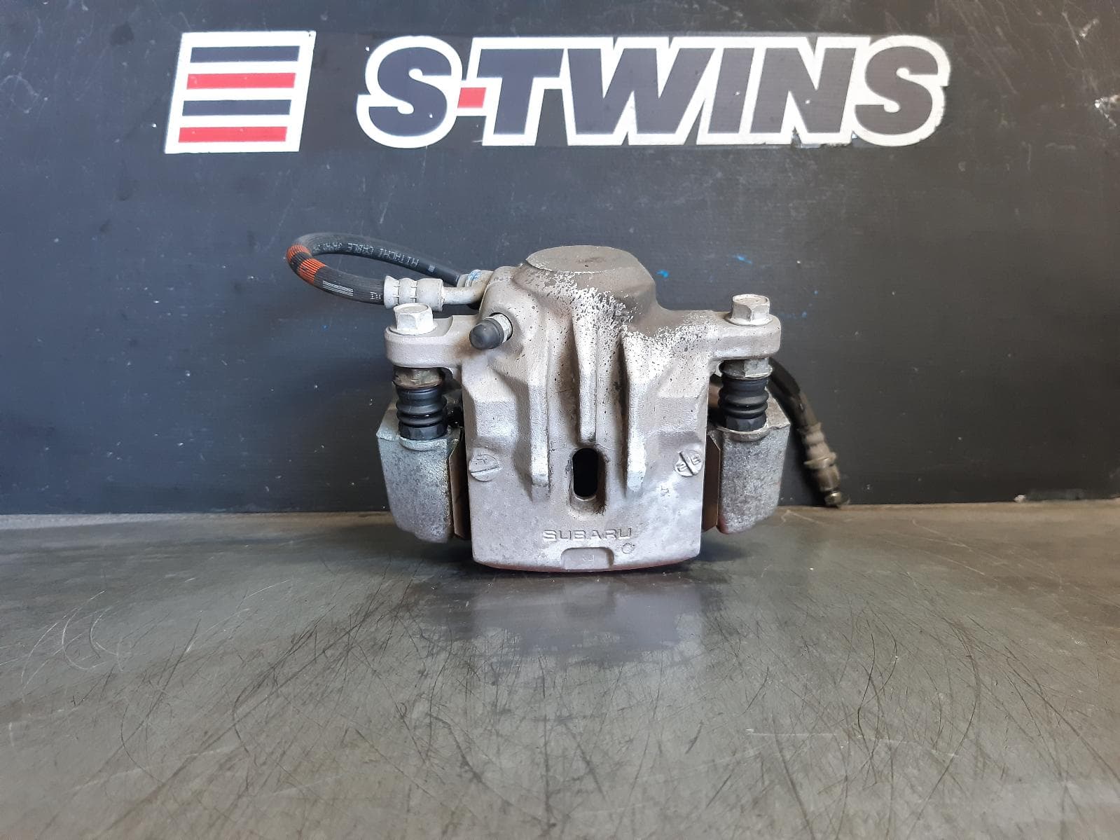 Used auto part listing image: 2014 SUBARU XV CALIPER LH REAR, G4X, 08/11-04/17 0000370517