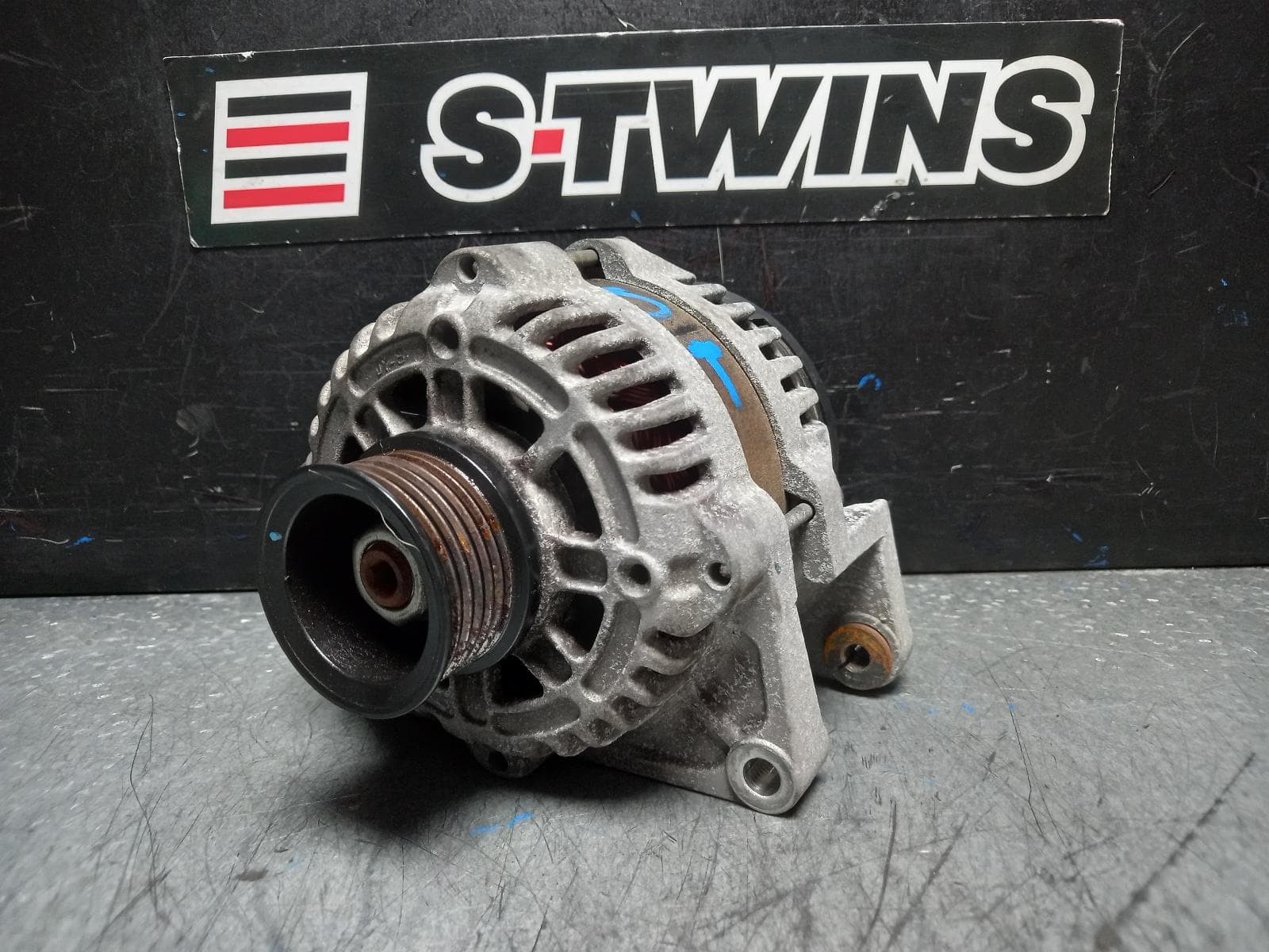 Used auto part listing image: 2013 HOLDEN BARINA ALTERNATOR PETROL, 1.6, MANUAL T/M, NON CLUTCH TYPE, TM, 09/11-12/18 0000387053