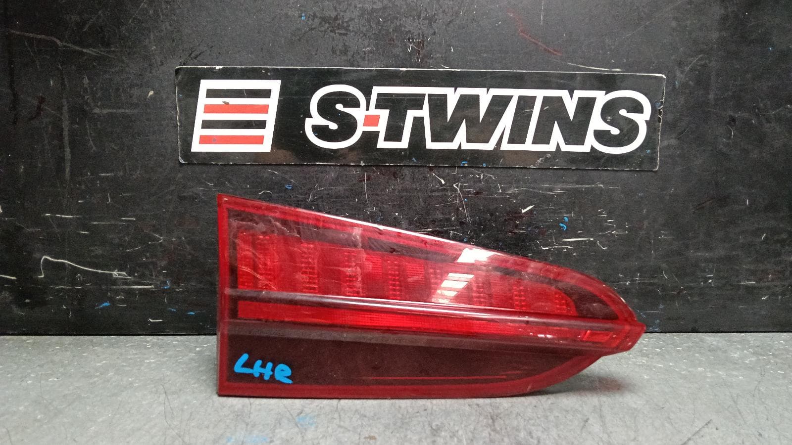 Used auto part listing image: 2021 HYUNDAI SANTA FE REAR GARNISH TAILGATE LAMP (LH SIDE), LED TYPE, TM, 10/20-10/23 0000401011