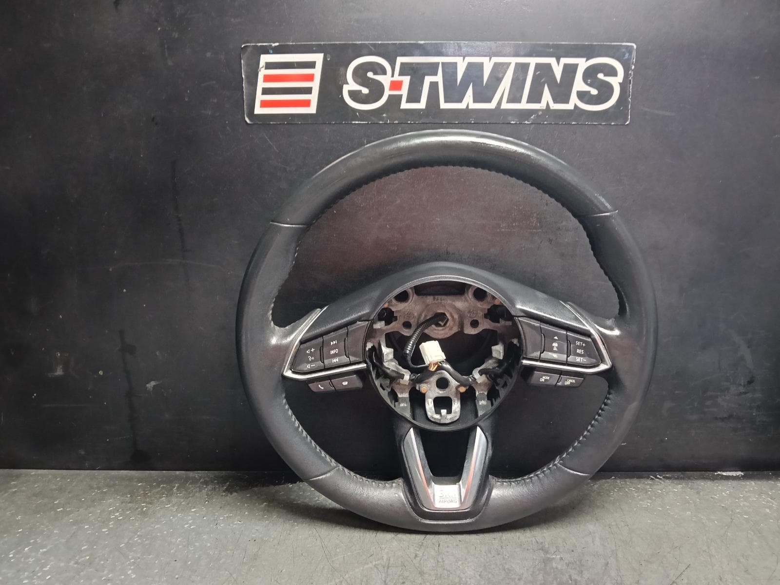 Used auto part listing image: 2020 MAZDA CX3 STEERING WHEEL LEATHER, DK, 03/15- 0000412934