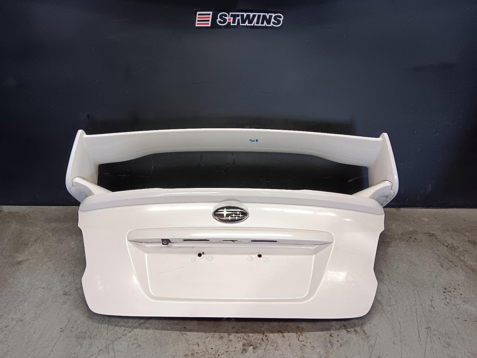 Used auto part listing image: 2015 SUBARU WRX BOOTLID TAILGATE BOOTLID, V1, STi, 2 POST SPOILER TYPE, 03/14-10/21 0000409812