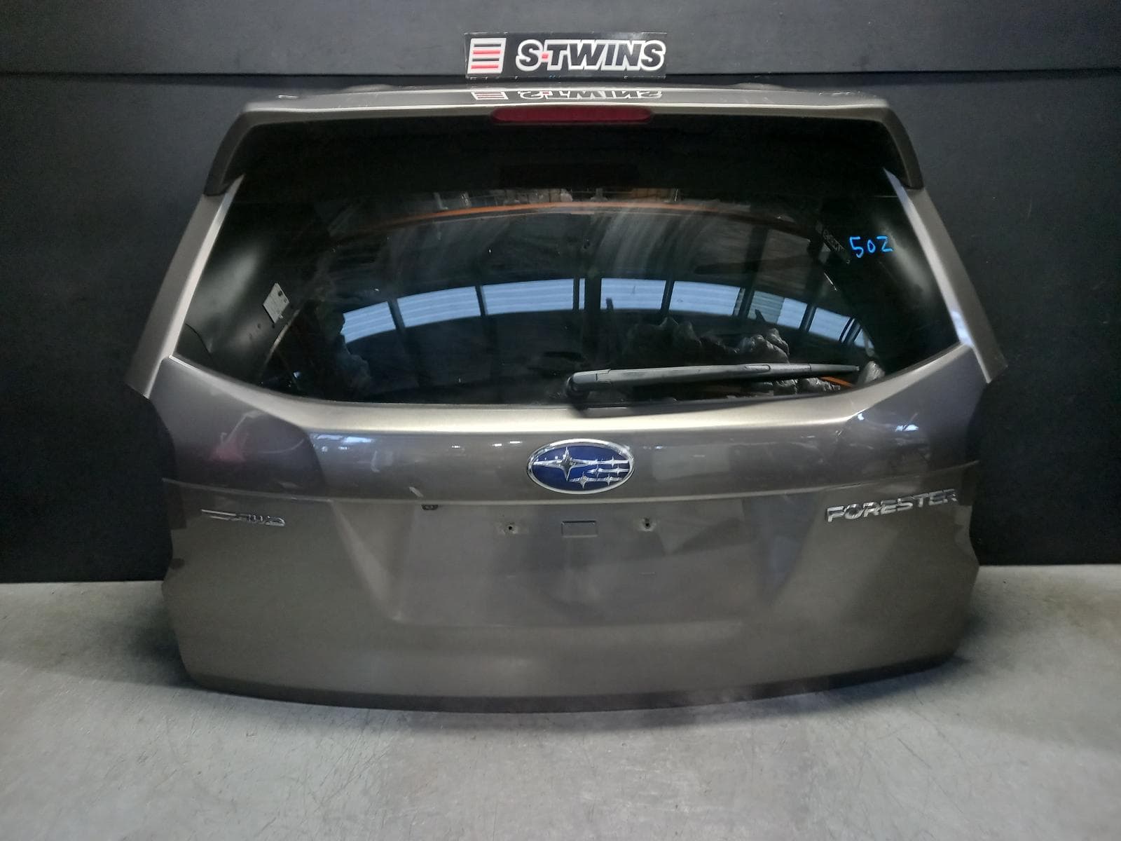 Used auto part listing image: 2017 SUBARU FORESTER BOOTLID TAILGATE TAILGATE, SJ, W/ POWER LIFTGATE TYPE, 01/16-08/18 0000406856