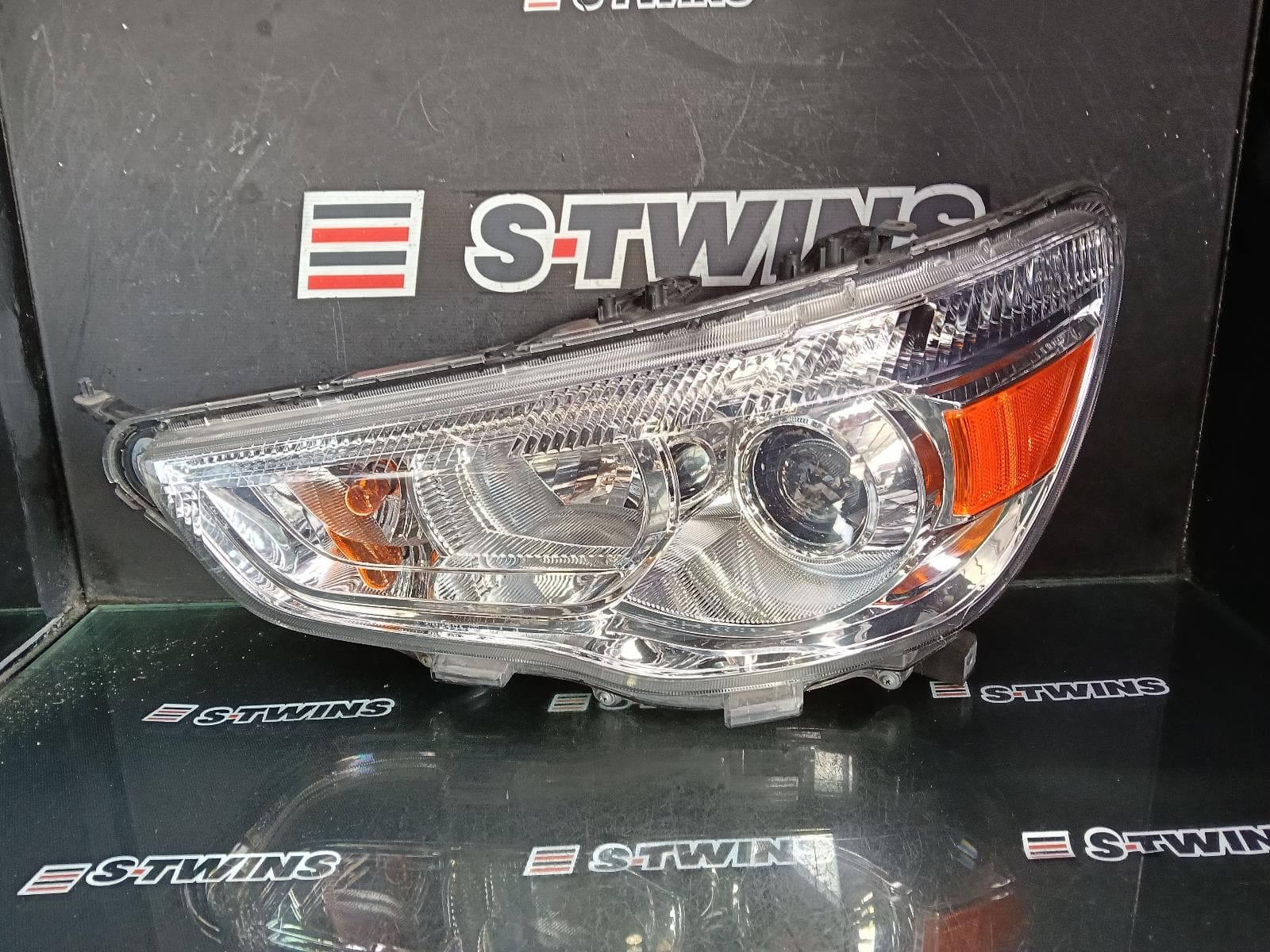 Used auto part listing image: 2019 MITSUBISHI ASX LEFT HEADLAMP XB-XC, HALOGEN, W/ DAYTIME RUNNING LAMP TYPE, 04/14-05/19 0000384973