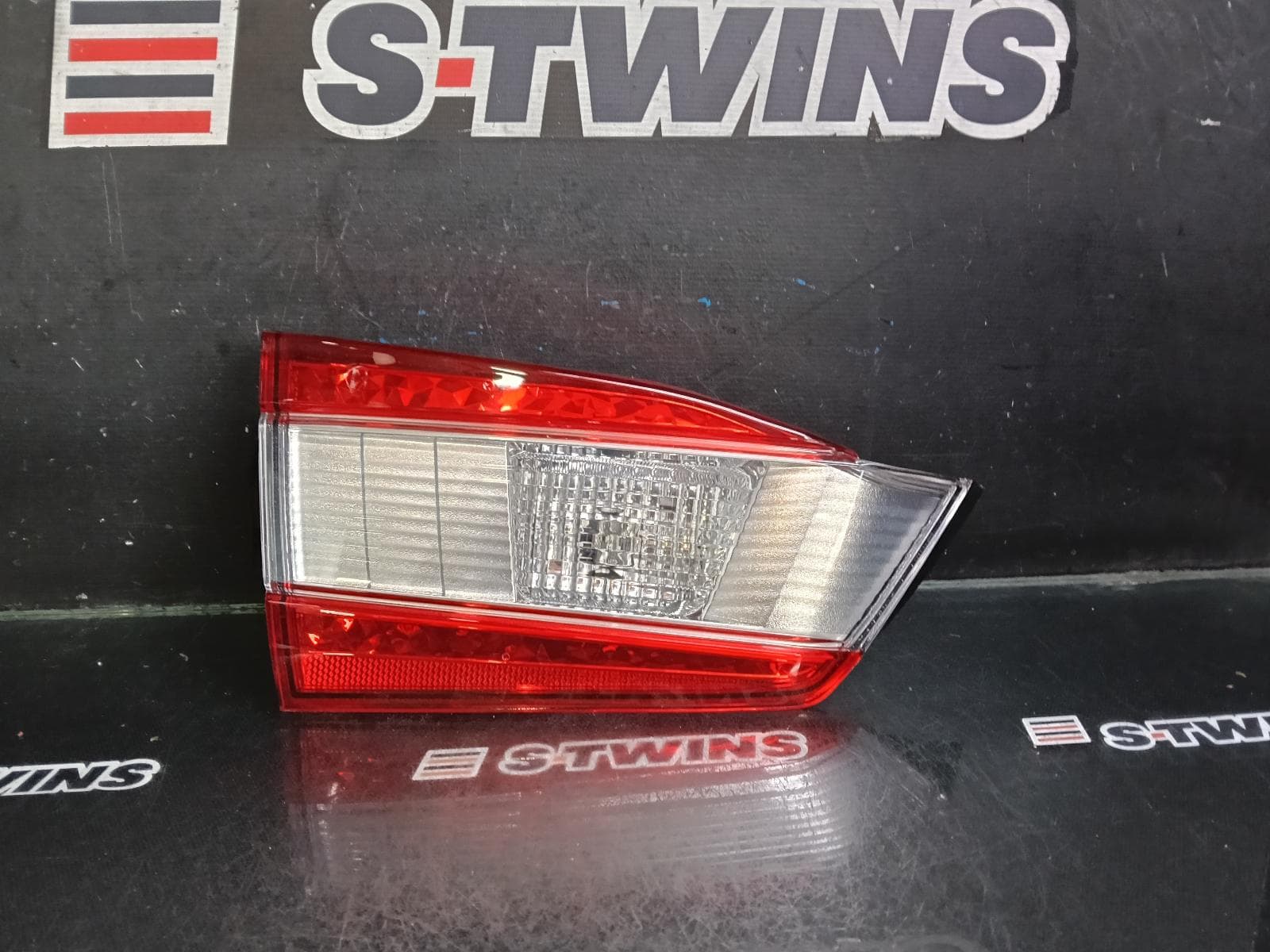 Used auto part listing image: 2020 SUBARU IMPREZA REAR GARNISH G5, BOOTLID LAMP (LH SIDE), W/ CHROME INSERT TYPE, 09/16-09/23 0000384134