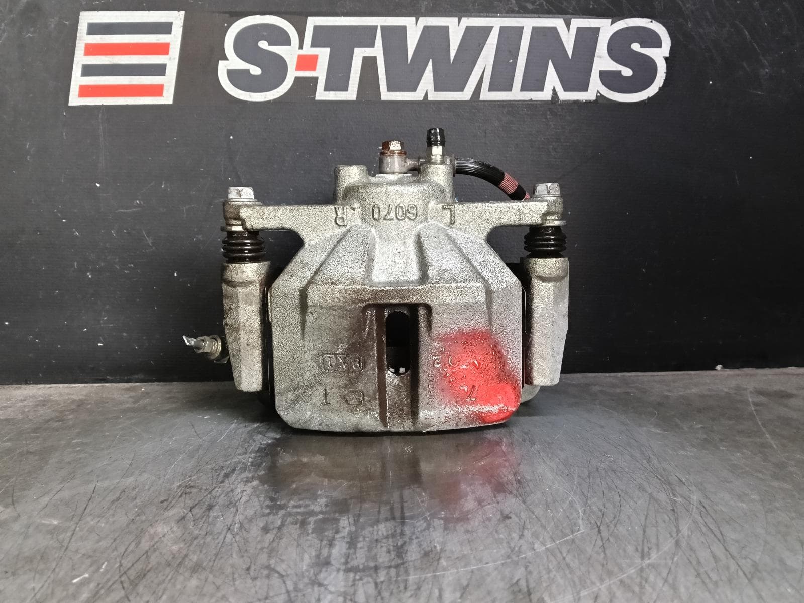 Used auto part listing image: 2018 MAZDA CX5 CALIPER LH FRONT, TWIN PISTON TYPE, KF, 02/17- 0000403635