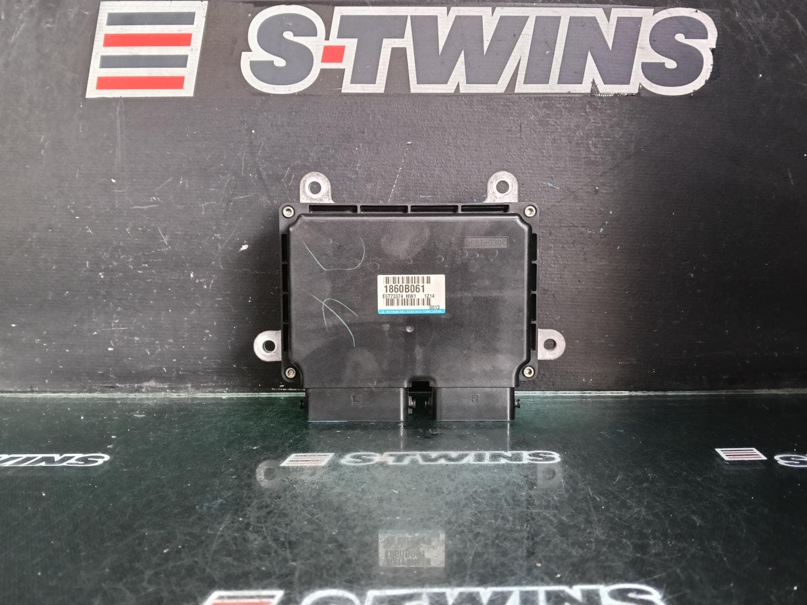 Used auto part listing image: 2012 MITSUBISHI LANCER ENGINE ECU, 2.4, AUTO T/M, ECU ONLY, P/N 1860C115, CJ, 07/07-06/12 0000403623