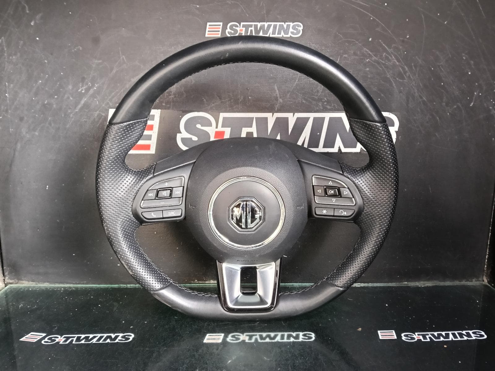 Used auto part listing image: 2024 MG ZS STEERING WHEEL AZS1, BLACK, LEATHER, W/ BLACK STITCHING, 09/17- 0000410075